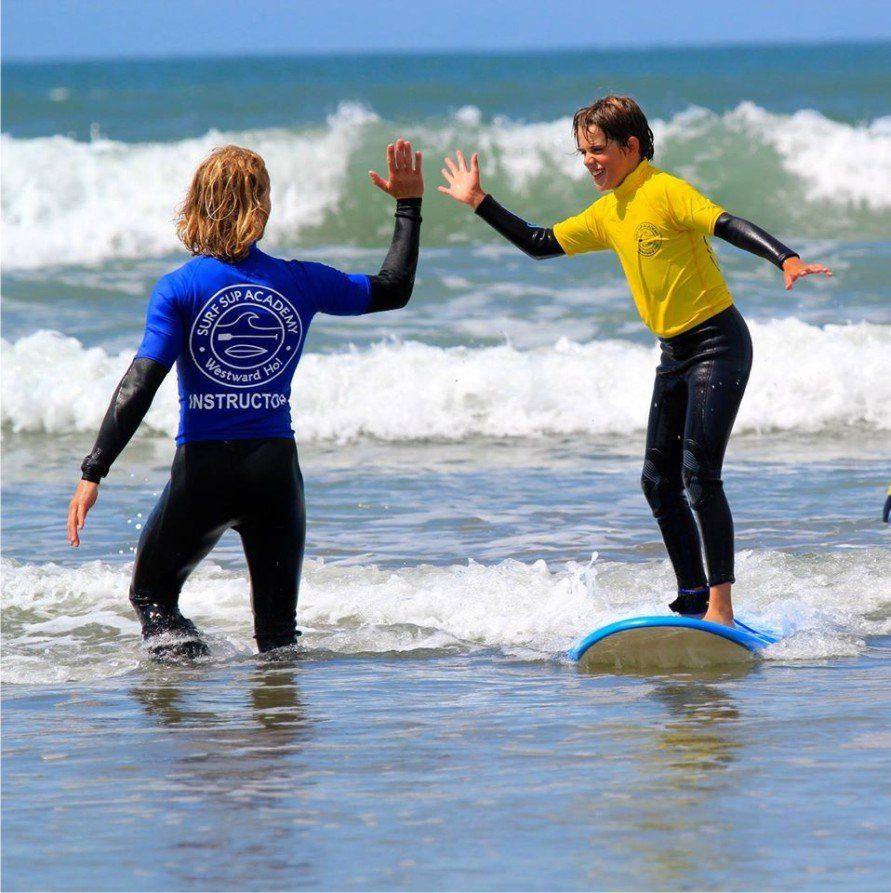 SurfSUP teaching surf lessons on the beach from Kitemare surf and kite shop