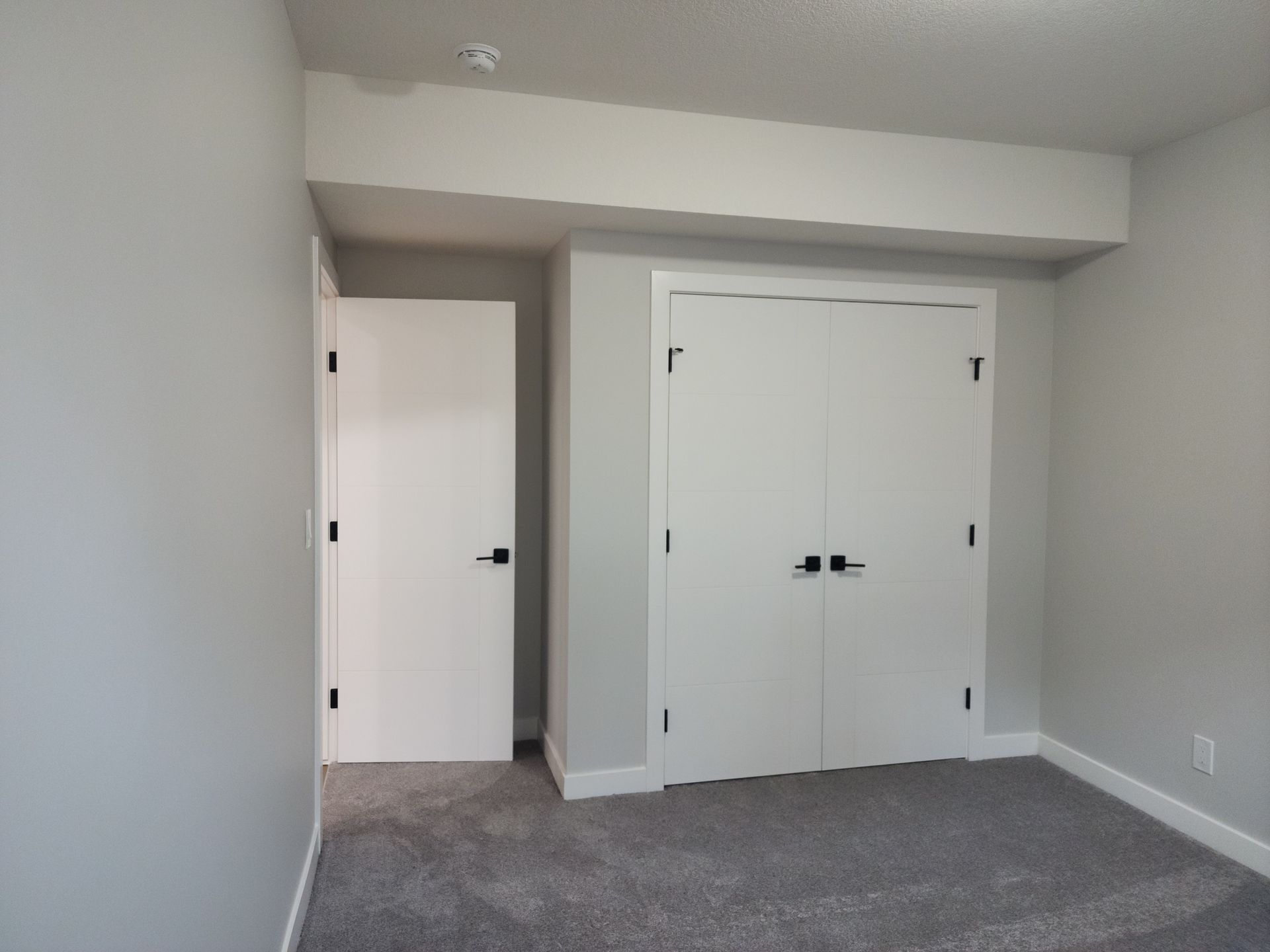 pictures of a closet in a bedroom on a basement development project