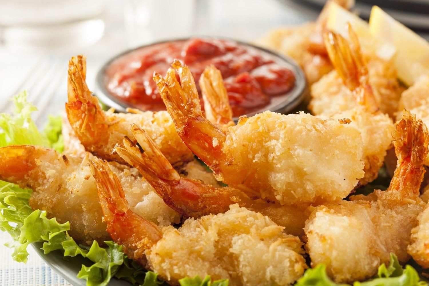 A Fried Shrimp Arranged on A Bed of Lettuce — Romanas Italian Restaurant in Nobby Beach, QLD