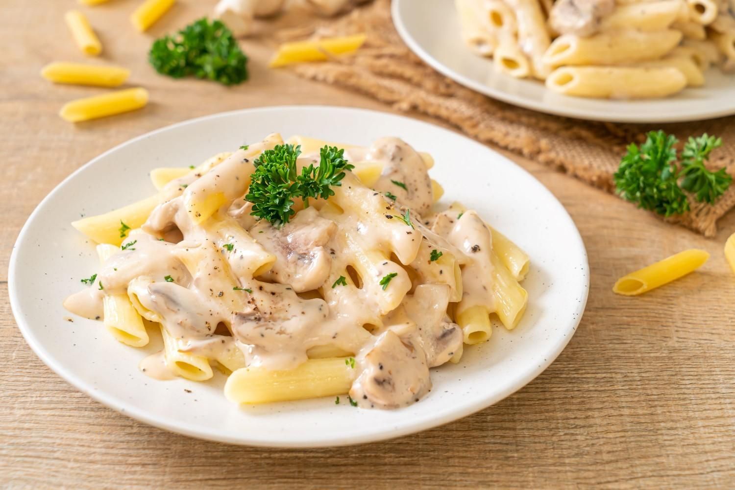 Penne Pasta with Creamy Mushroom Sauce — Romanas Italian Restaurant in Nobby Beach, QLD