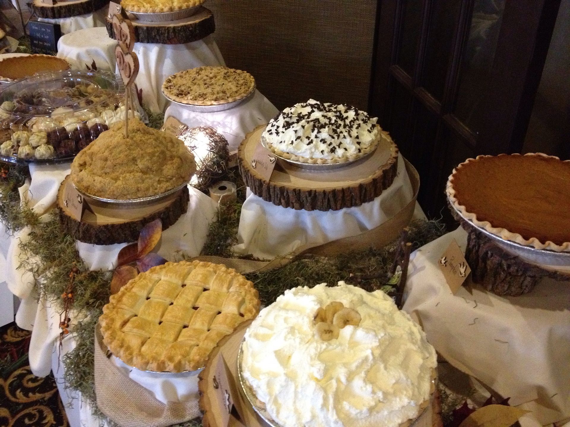 there are many different types of pies on the table .