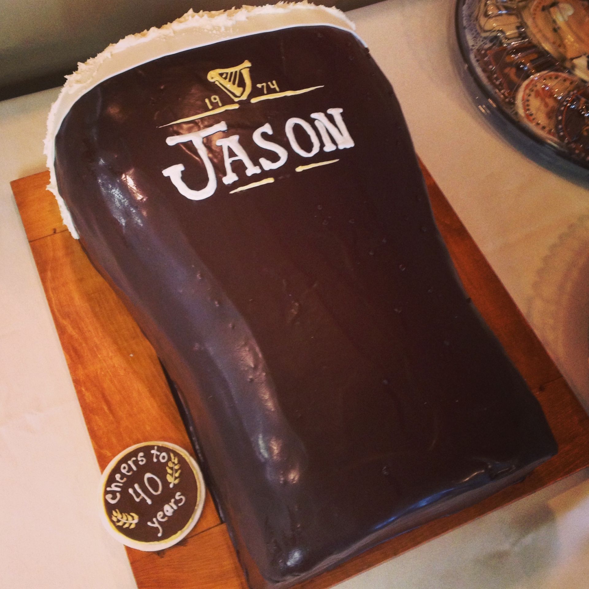 a cake that has the name jason on it