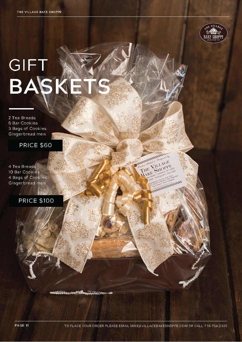 a gift basket wrapped in plastic with a bow on a wooden table .