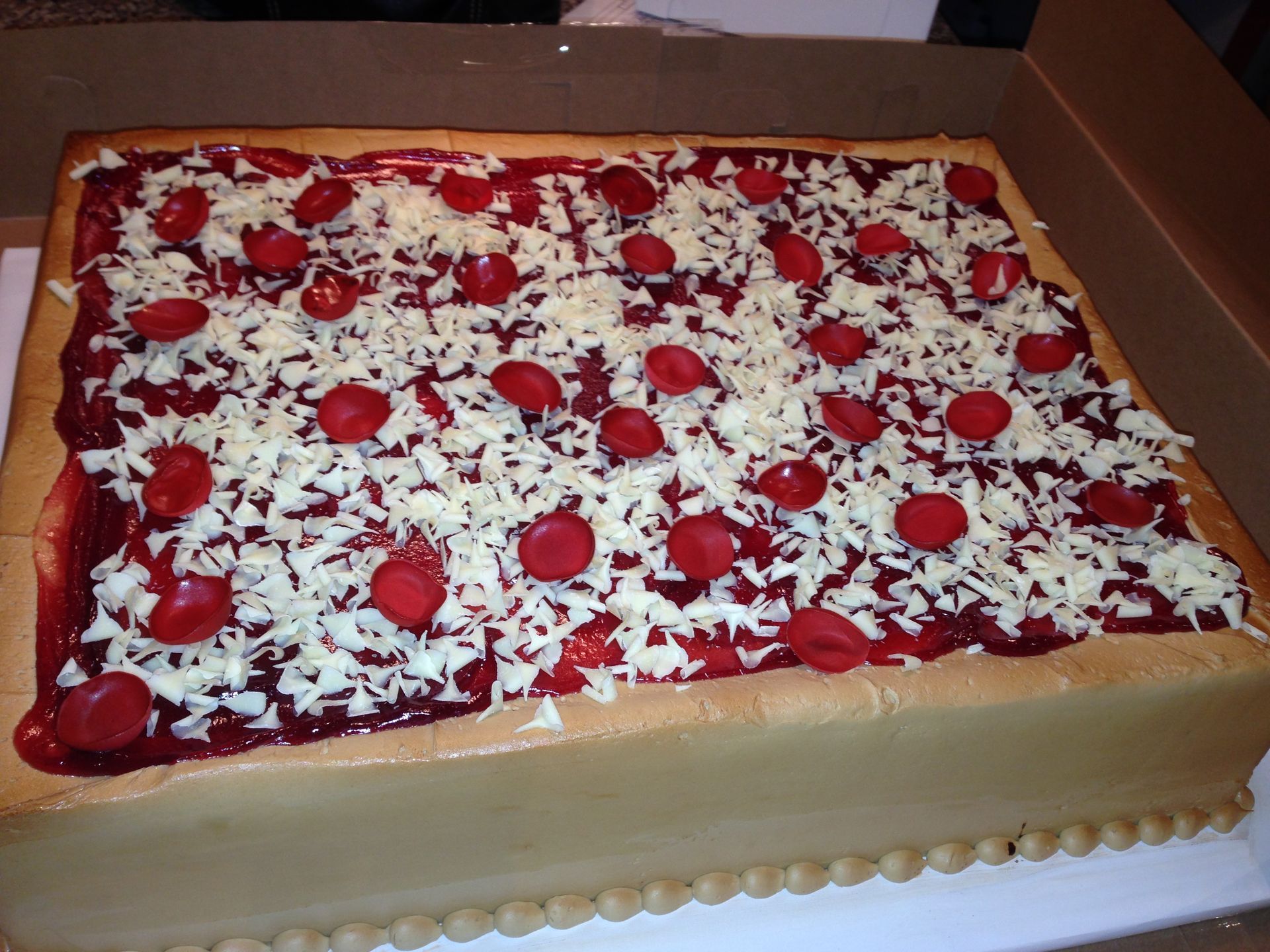 a pizza cake with pepperoni and cheese on top