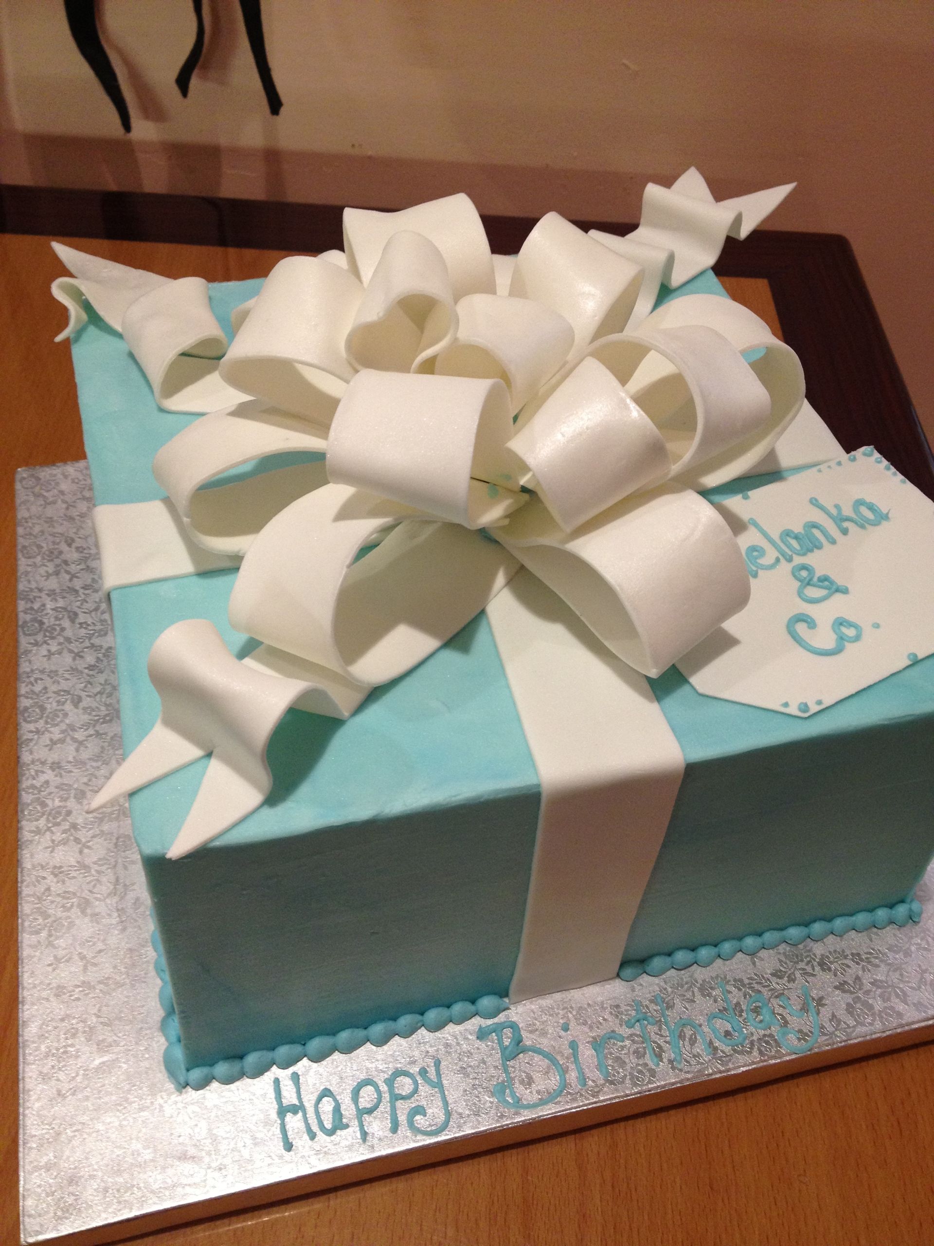 a birthday cake that looks like a gift box
