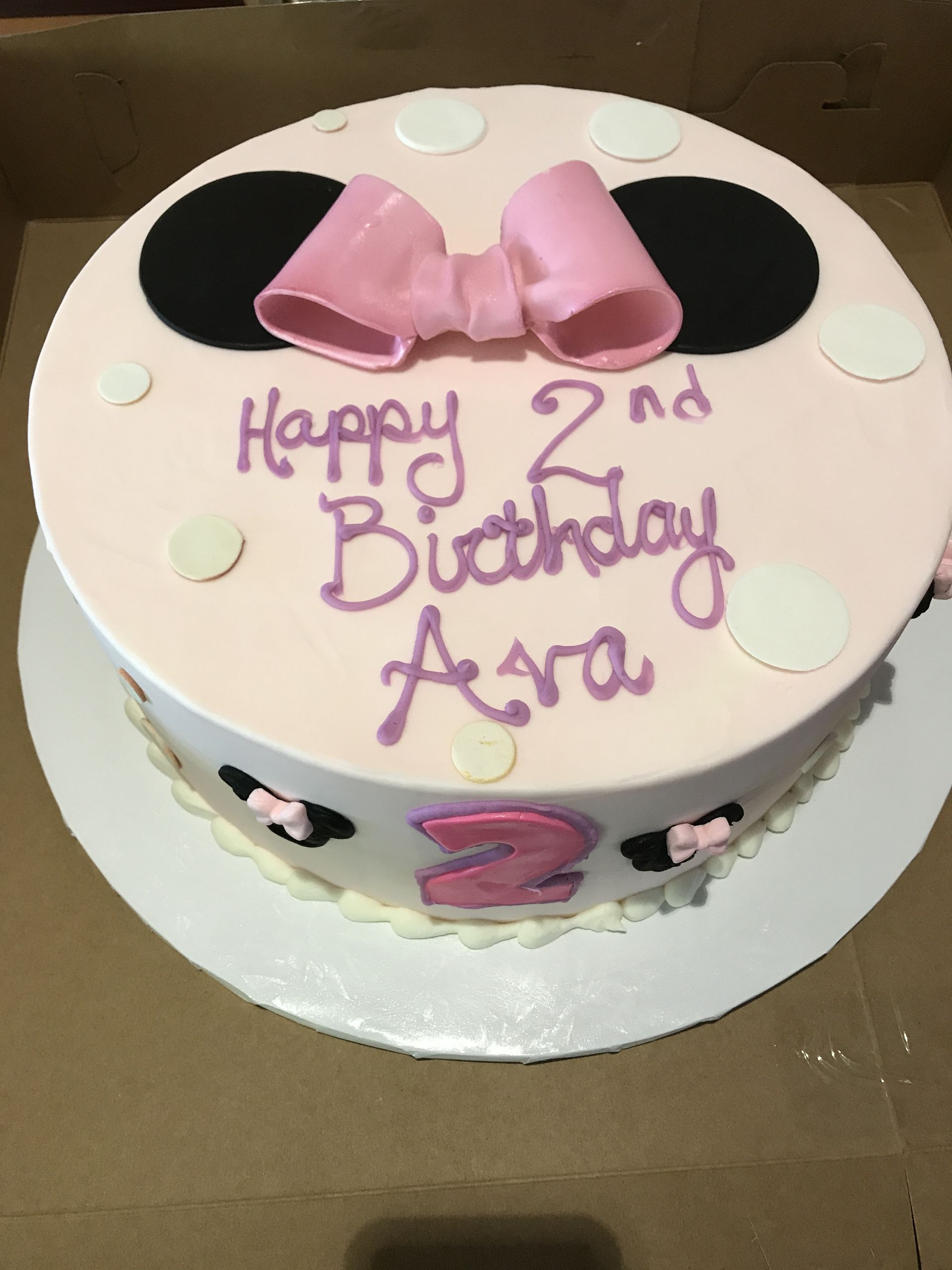 a cake that says happy 2nd birthday ara on it