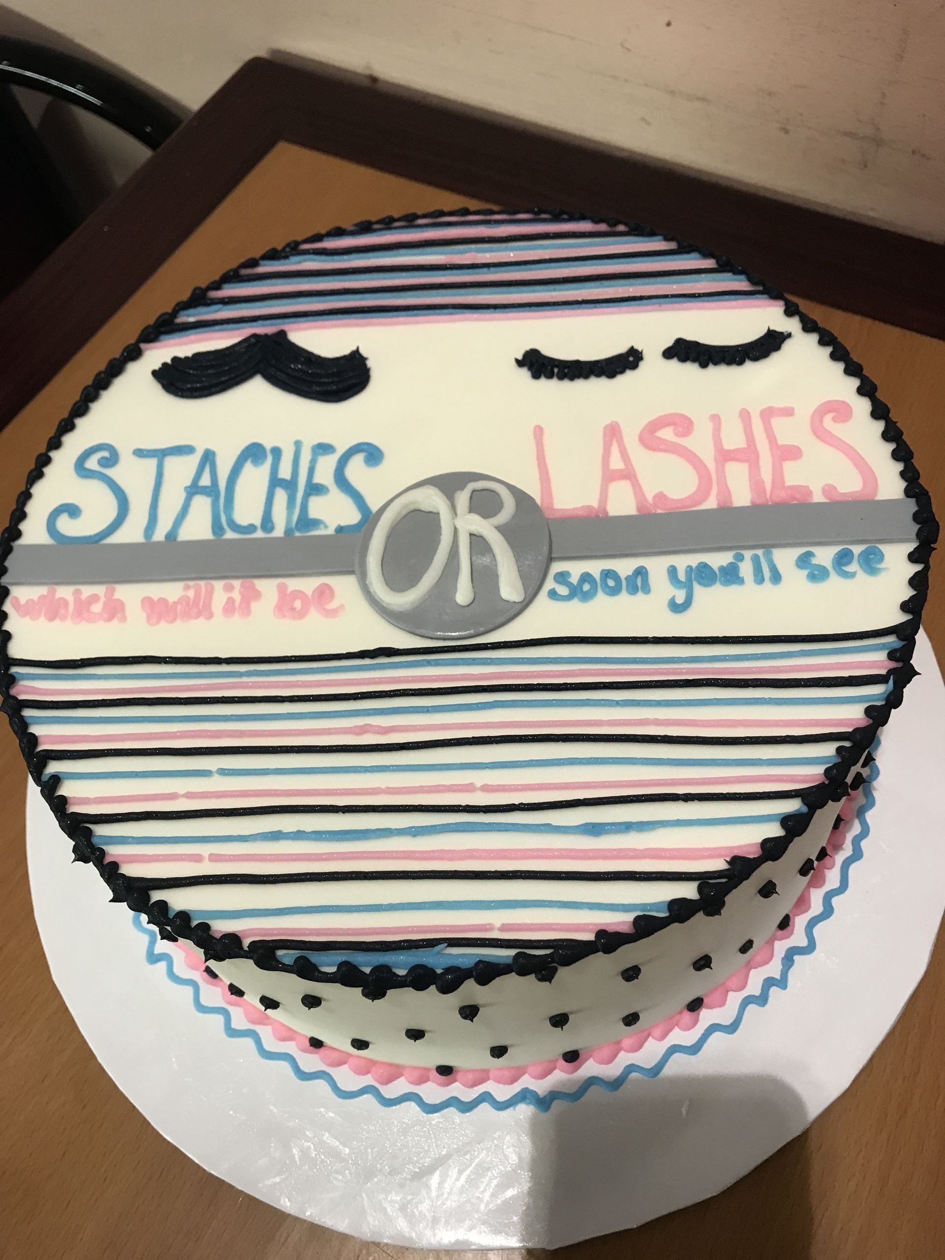 a cake that says staches or lashes on it