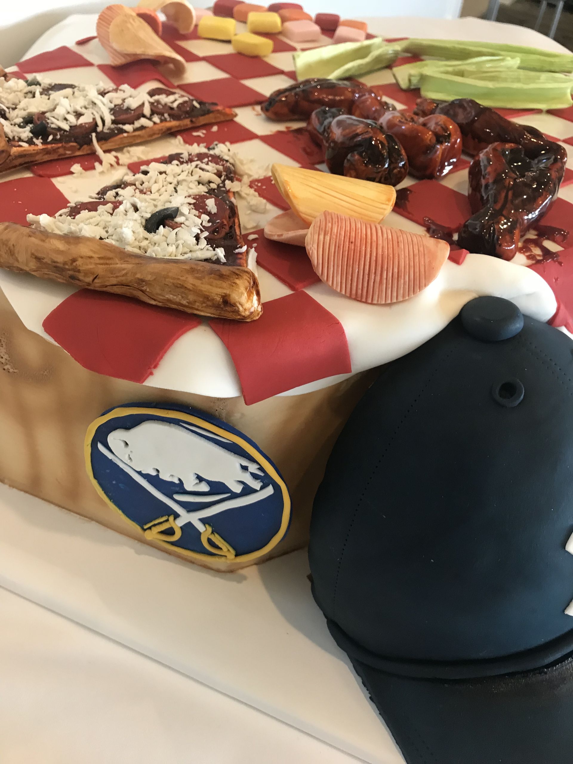 a cake with a sabres logo on it