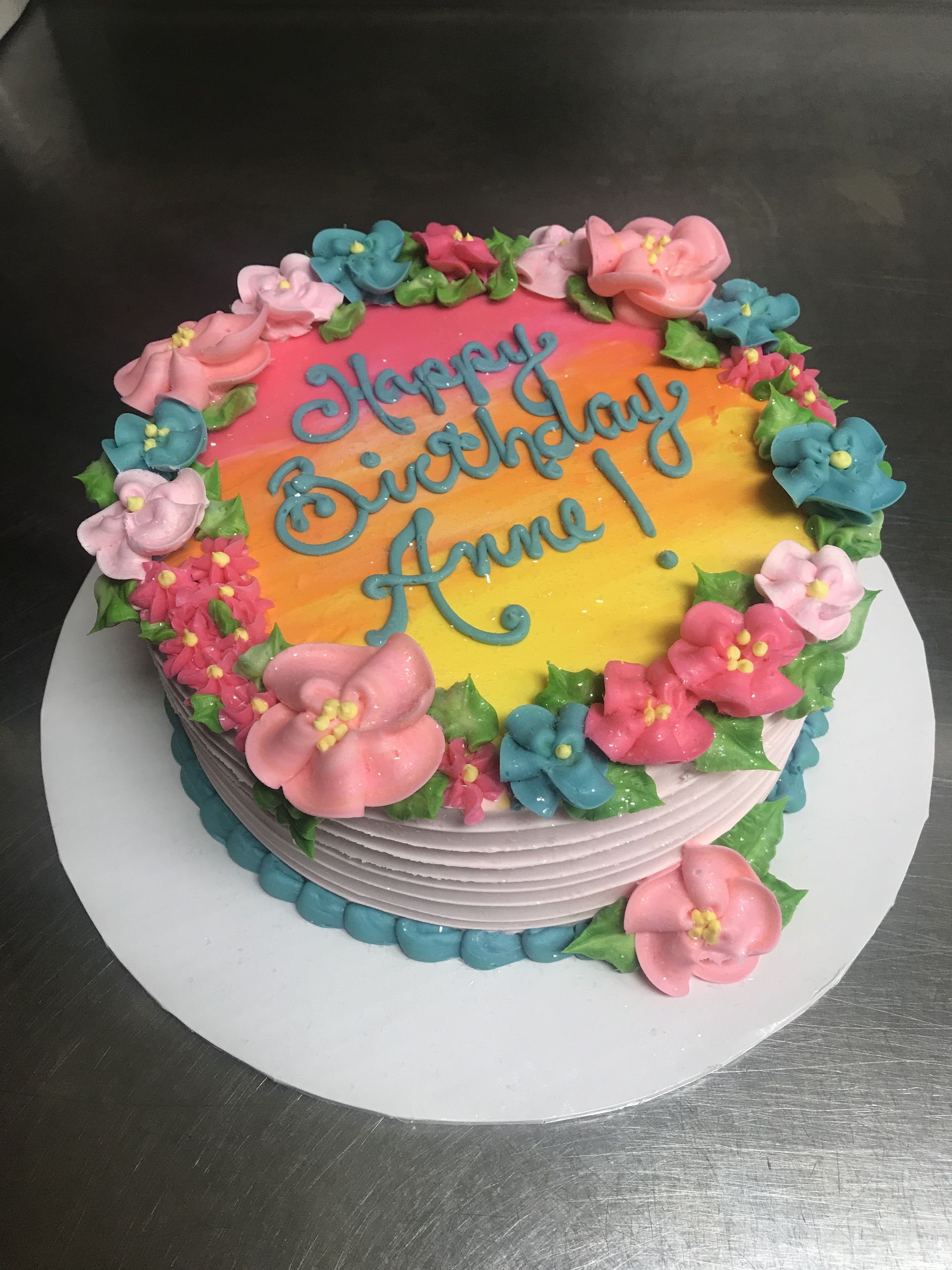 a birthday cake that says happy birthday anne 16 on it