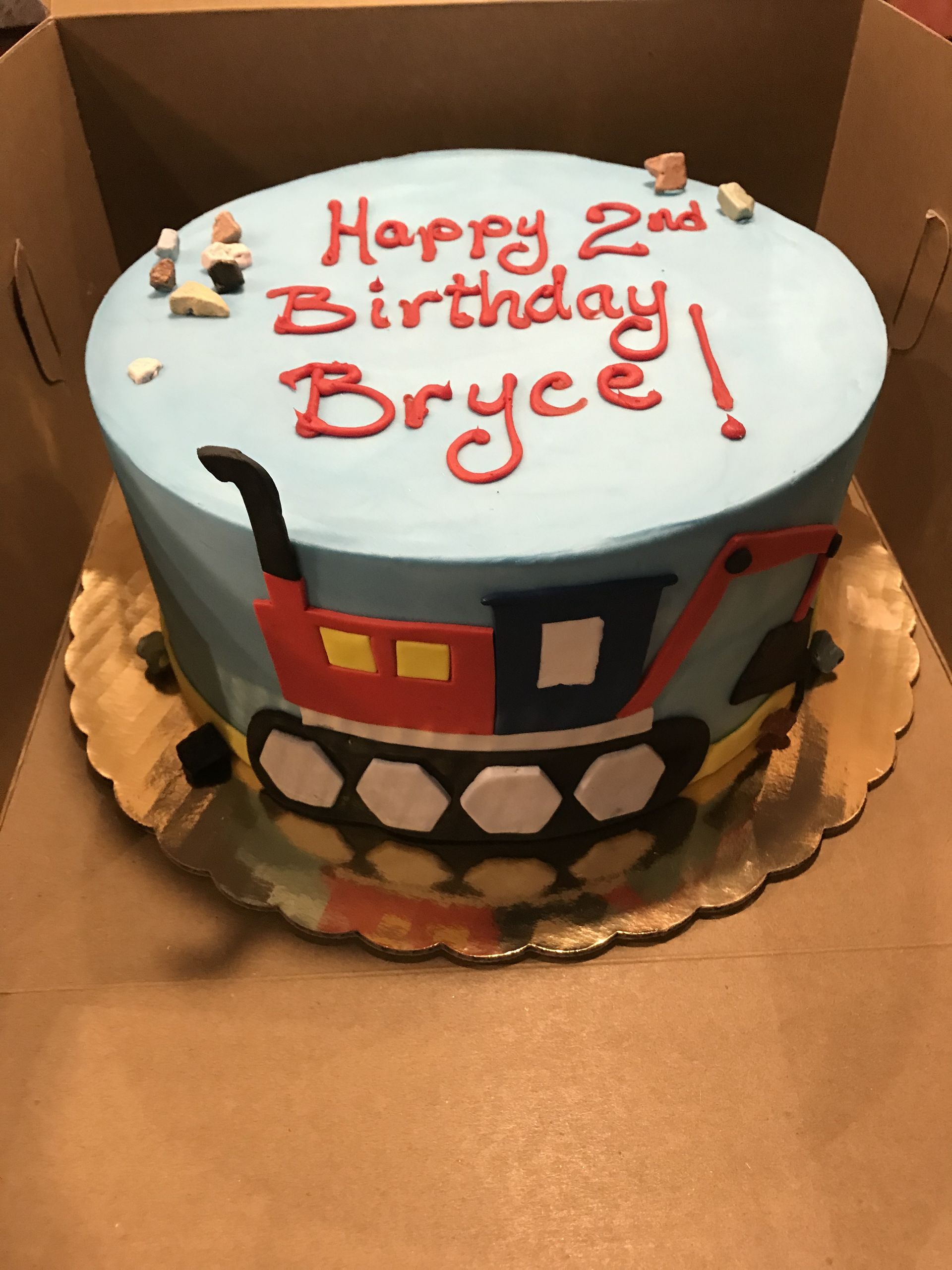 a cake that says happy 2nd birthday bryce on it
