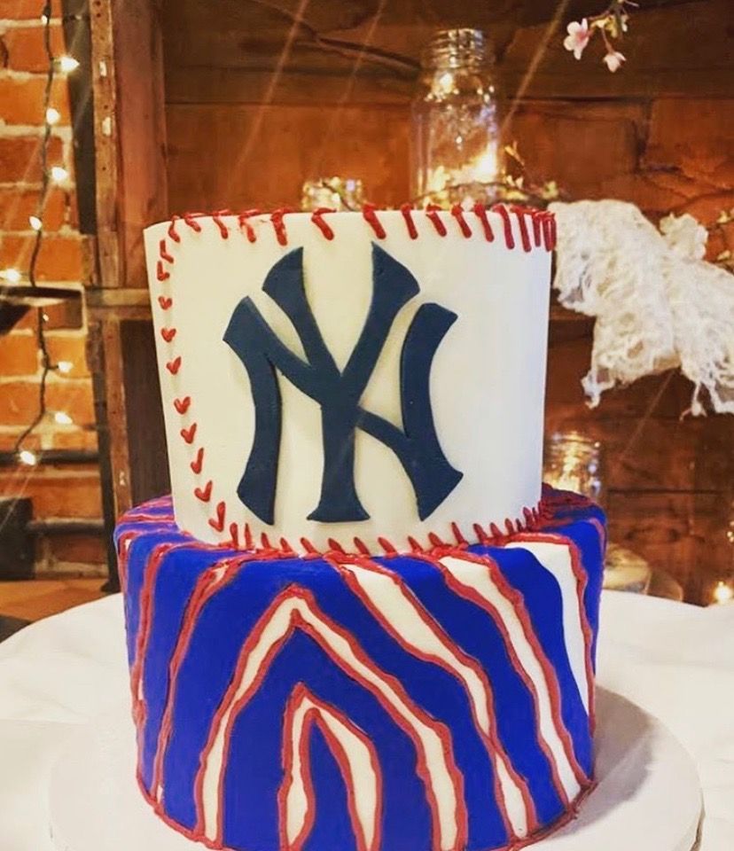 a new york yankees cake with red white and blue stripes