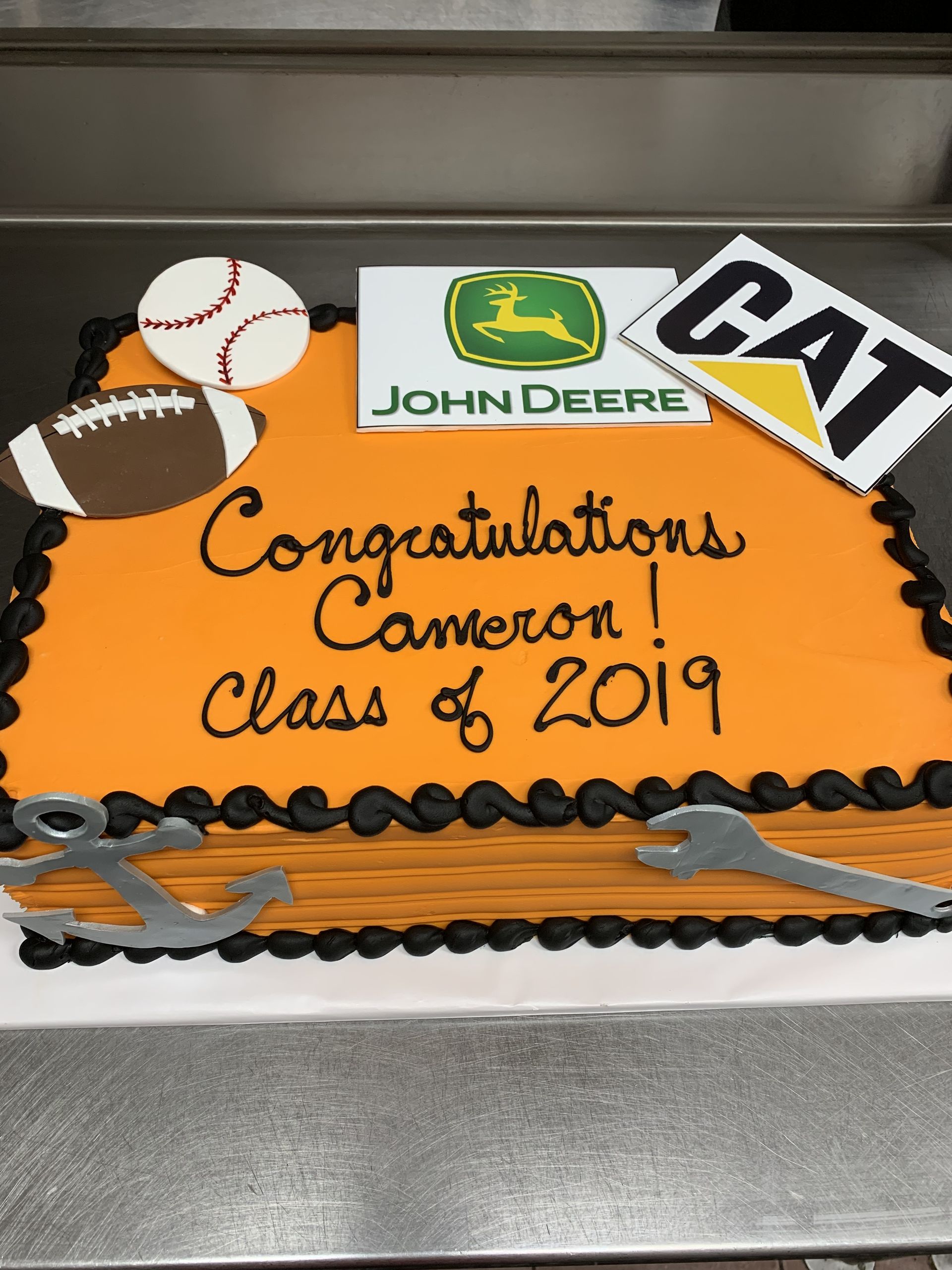 a cake that says congratulations cameron class of 2019