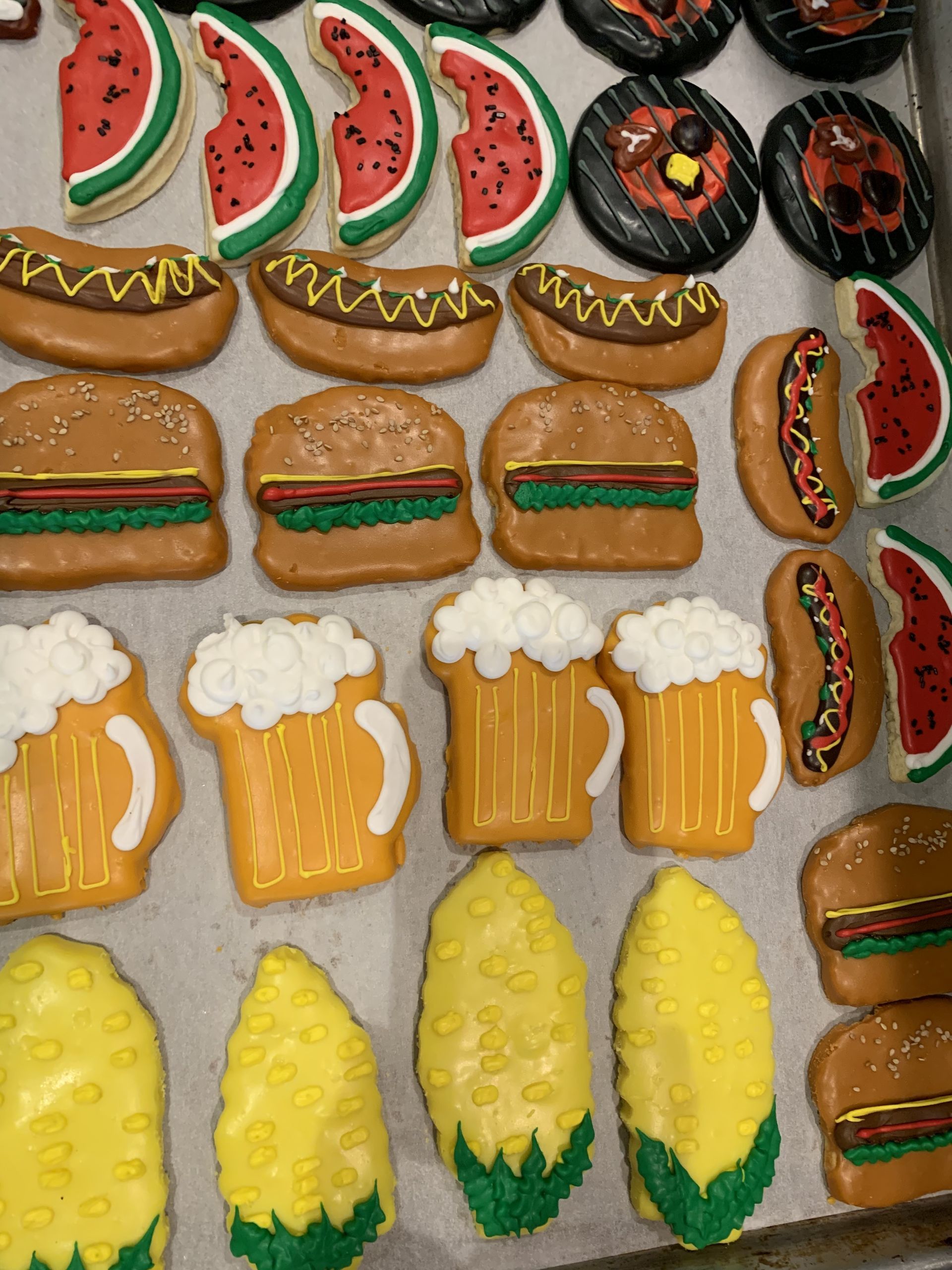 a bunch of food shaped cookies on a table