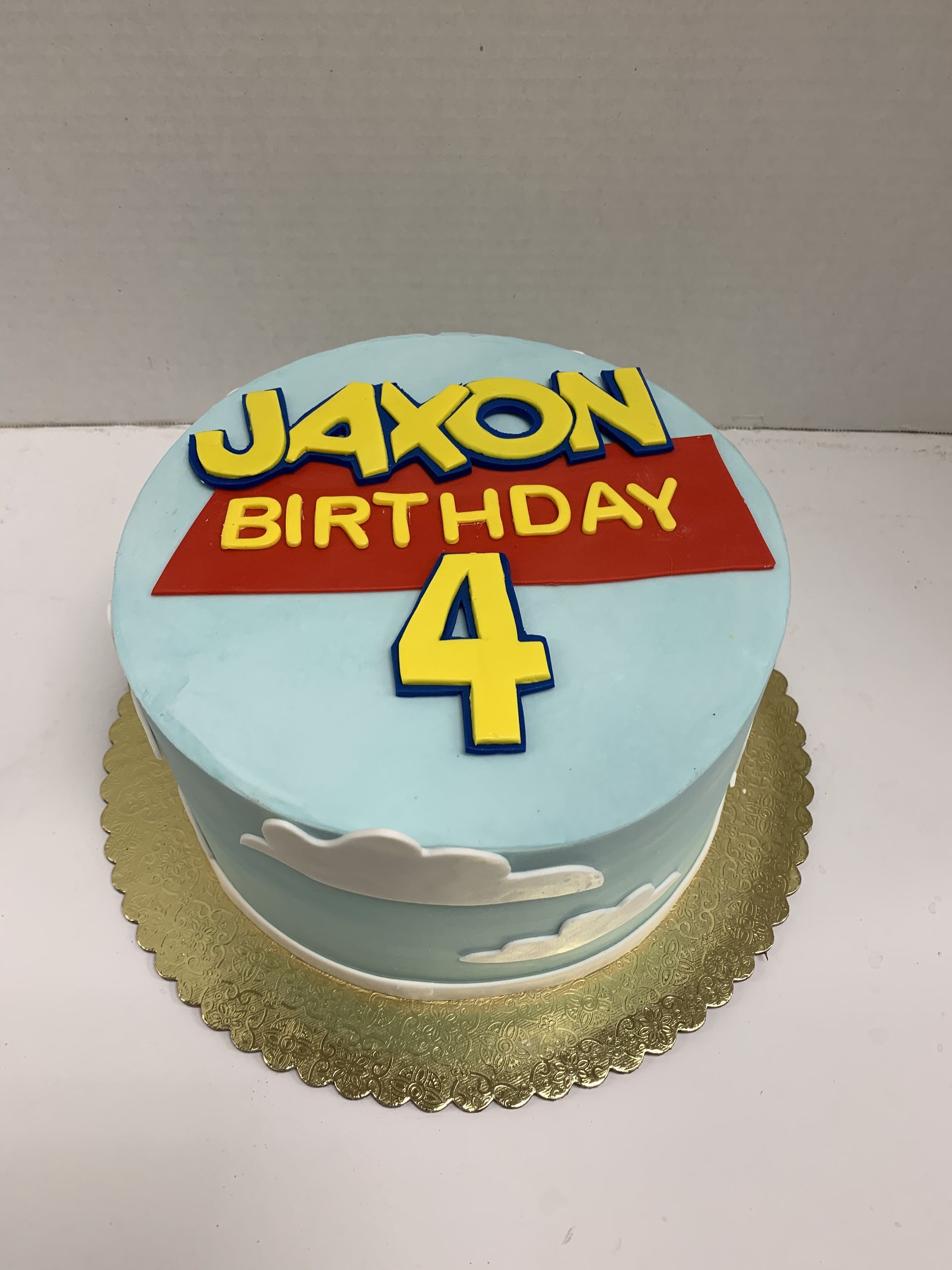 a birthday cake with the name jaxon on it