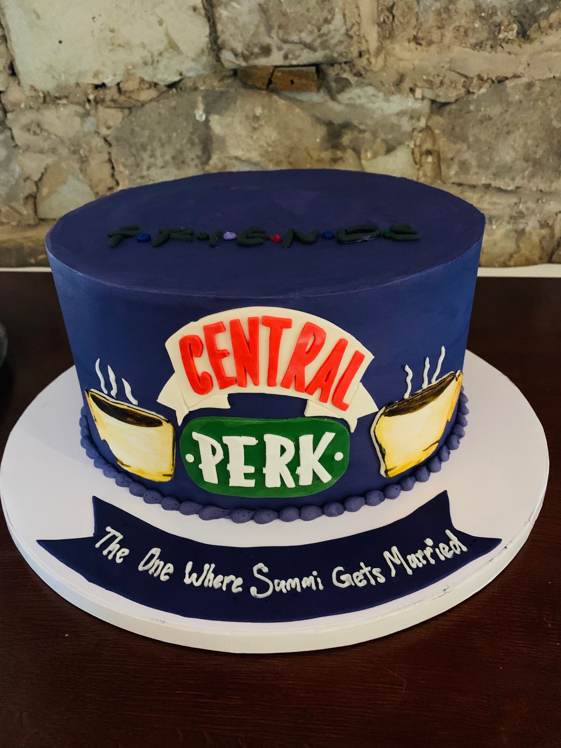 a cake that says central perk on it