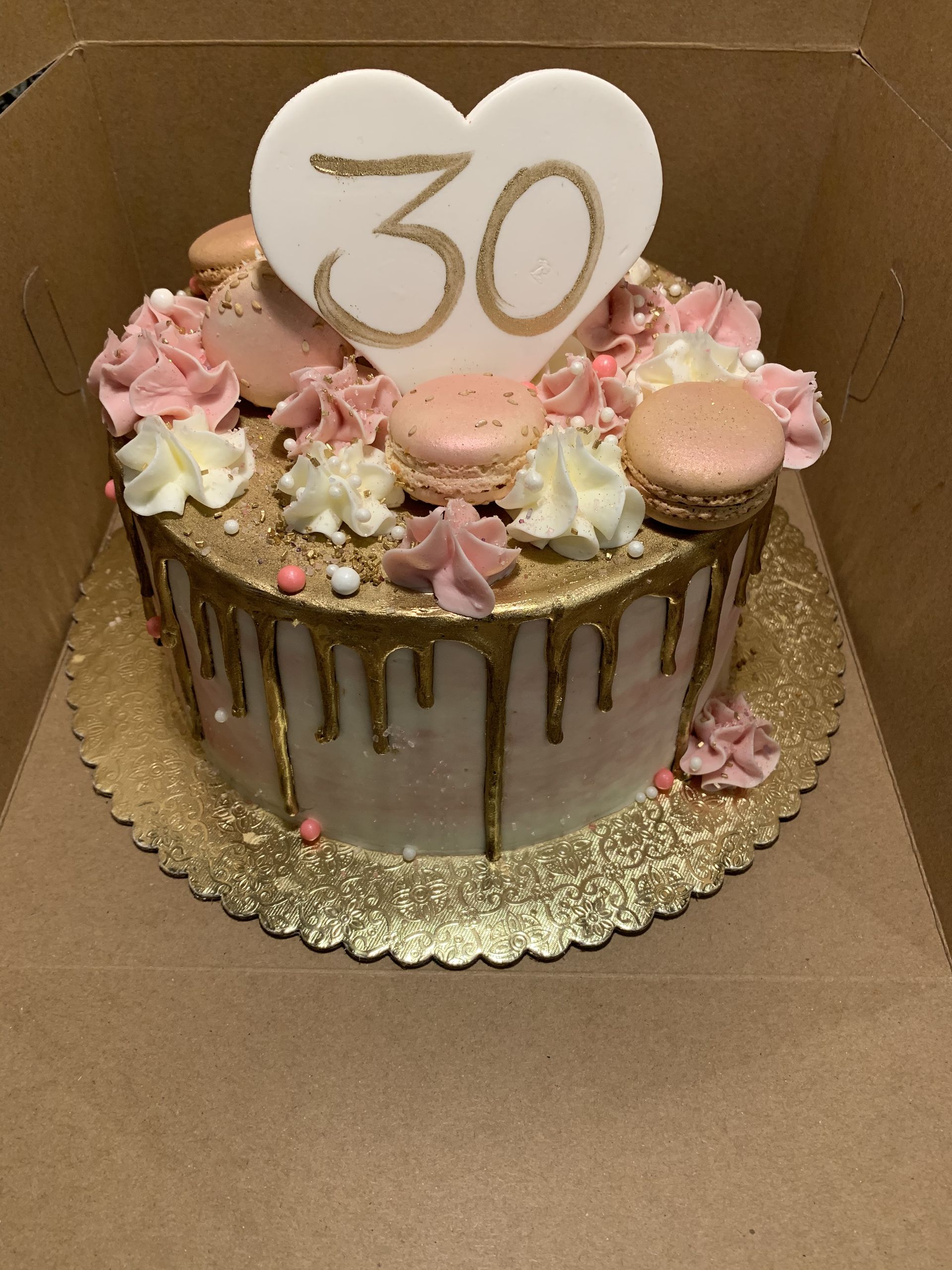 a cake with a heart and the number 30 on it