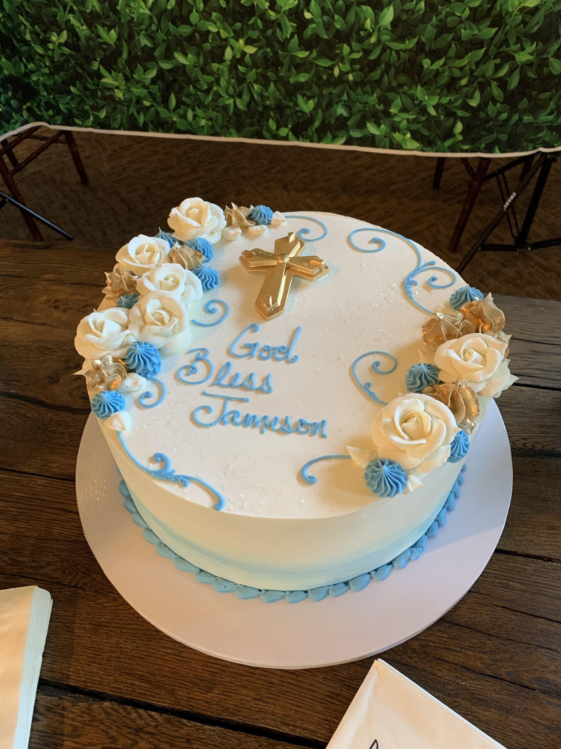 a cake that says god bless thompson on it
