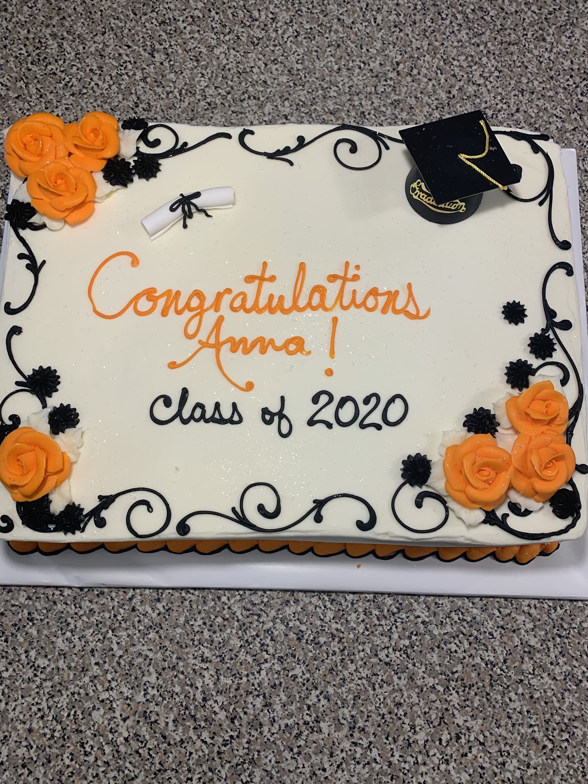 a cake that says congratulations anna class of 2020