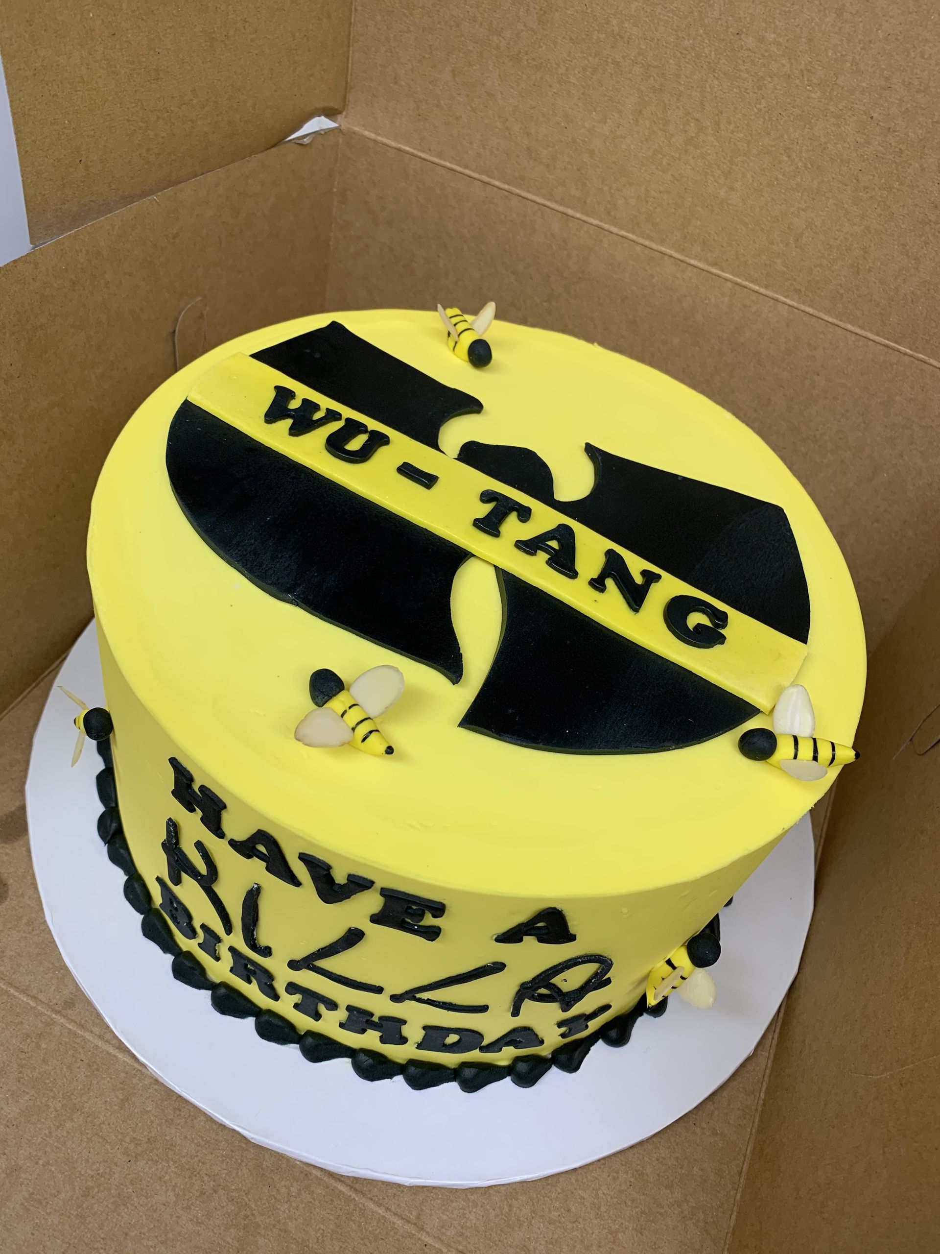 a yellow cake with the words have a blast on it