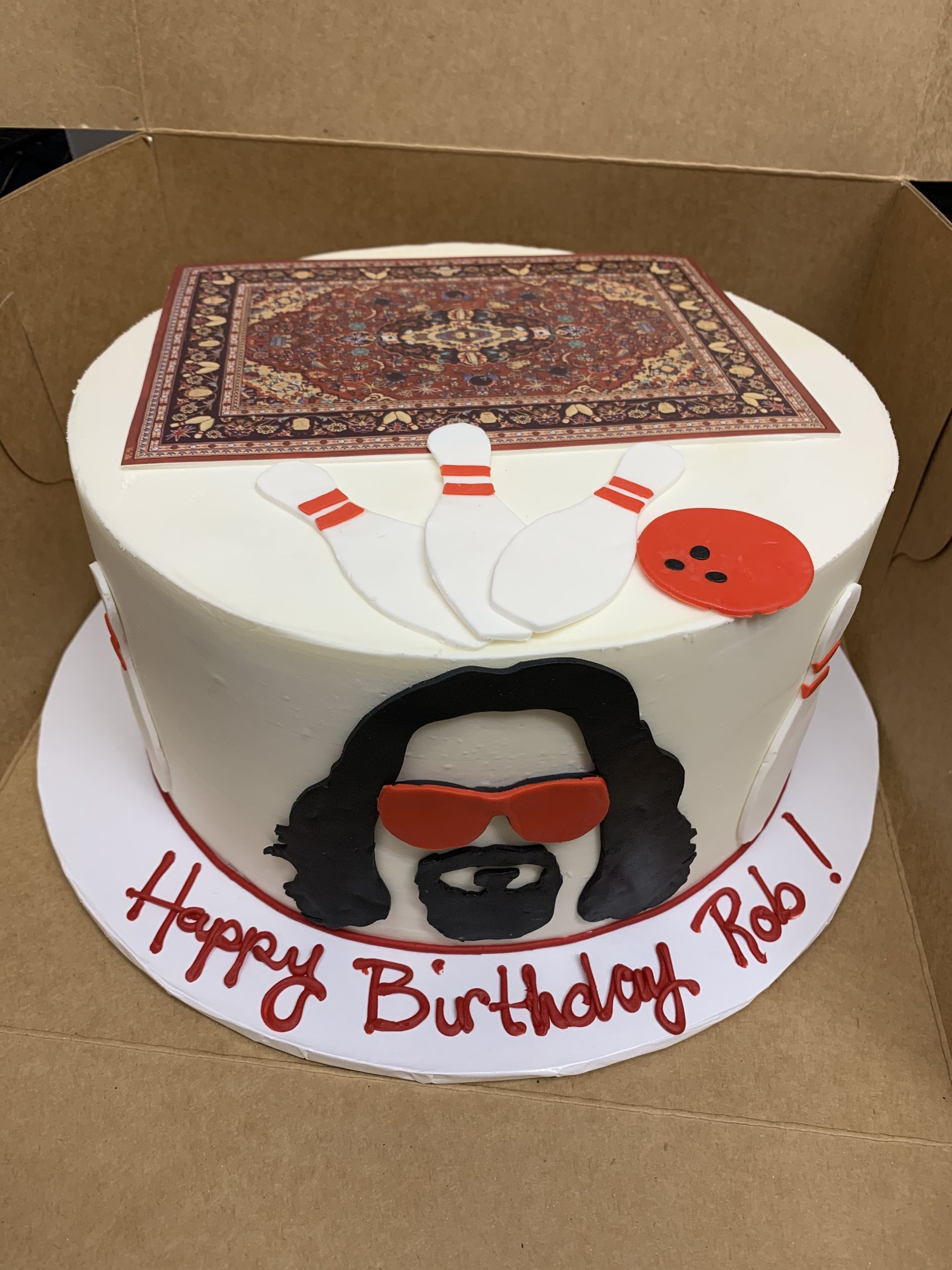 a birthday cake with a bowling alley scene on it