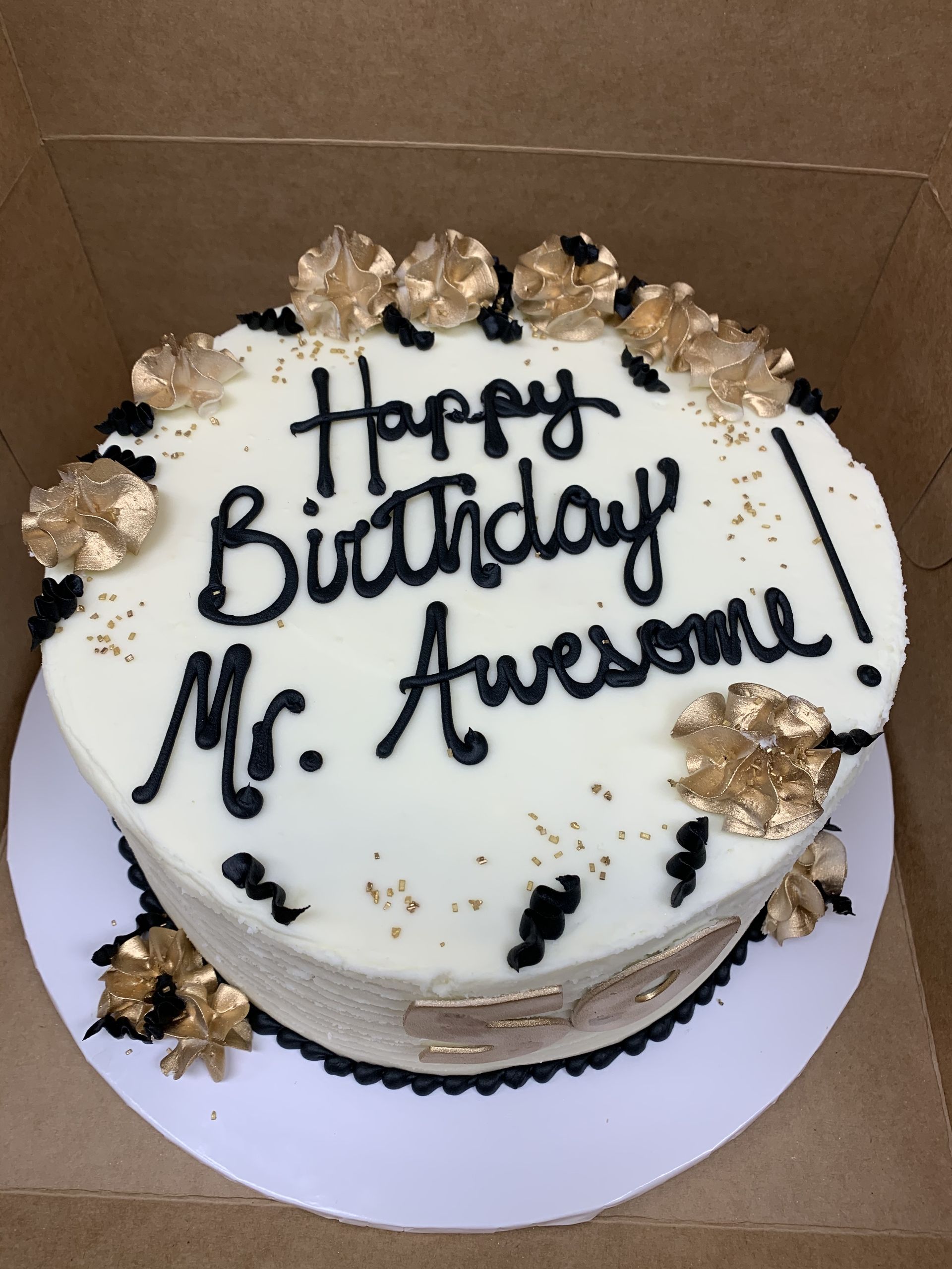 a birthday cake that says happy birthday mr. awesome