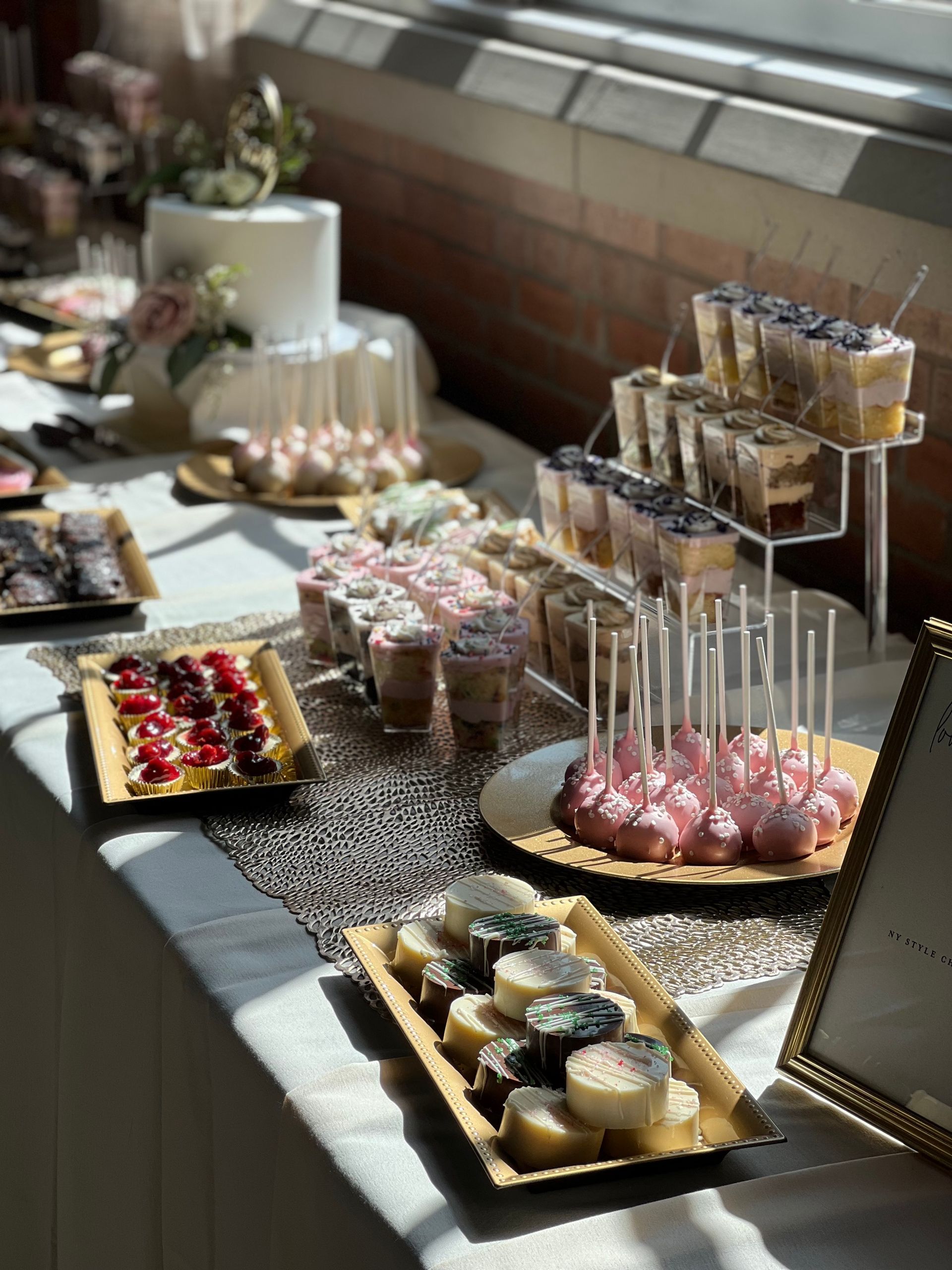 there are many different types of desserts on the table .