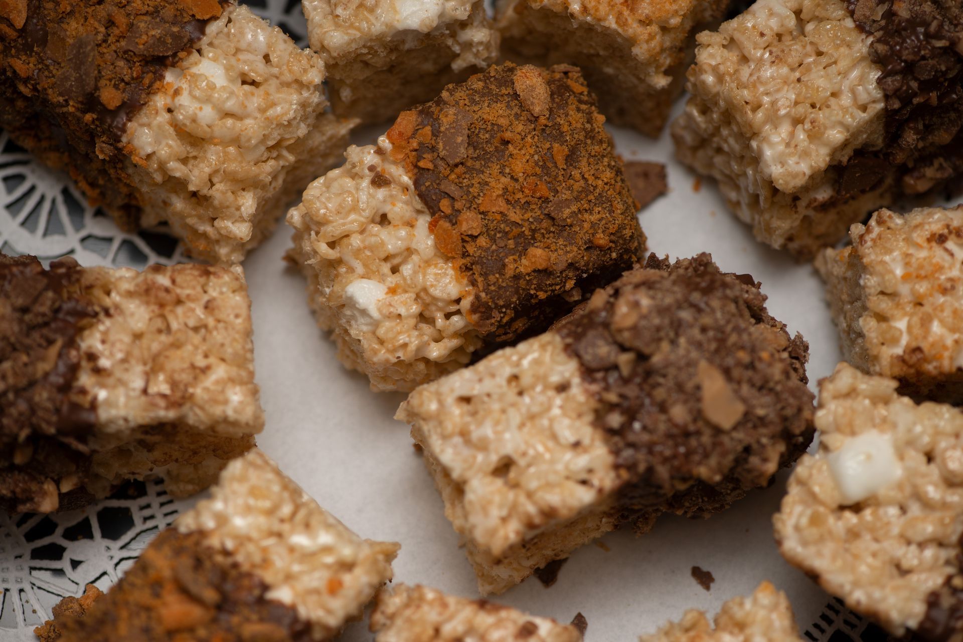 there are many different types of rice krispie treats on a plate .