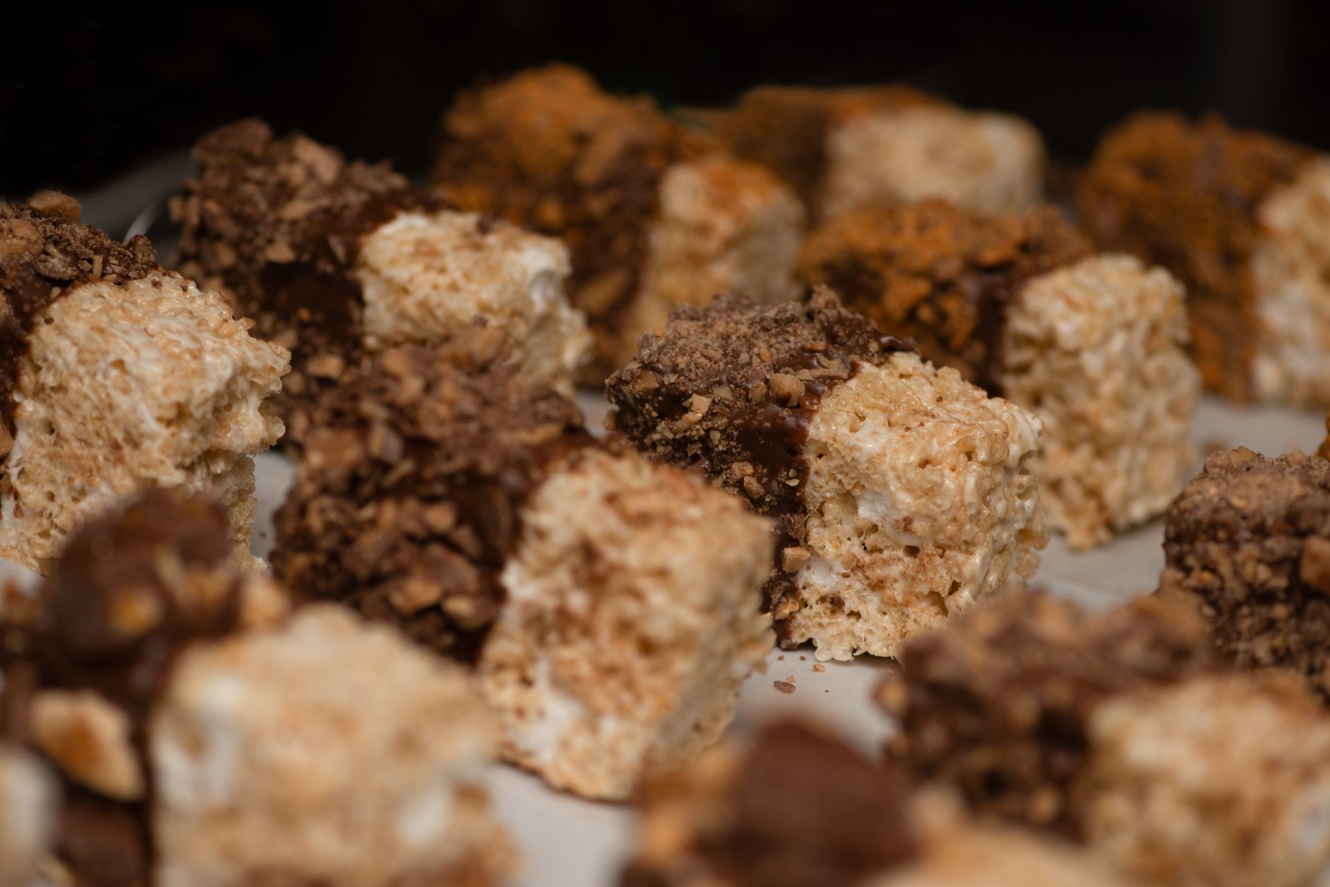 there are many different types of marshmallows on the table .