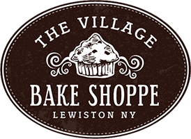 a logo for the village bake shoppe in lewiston ny