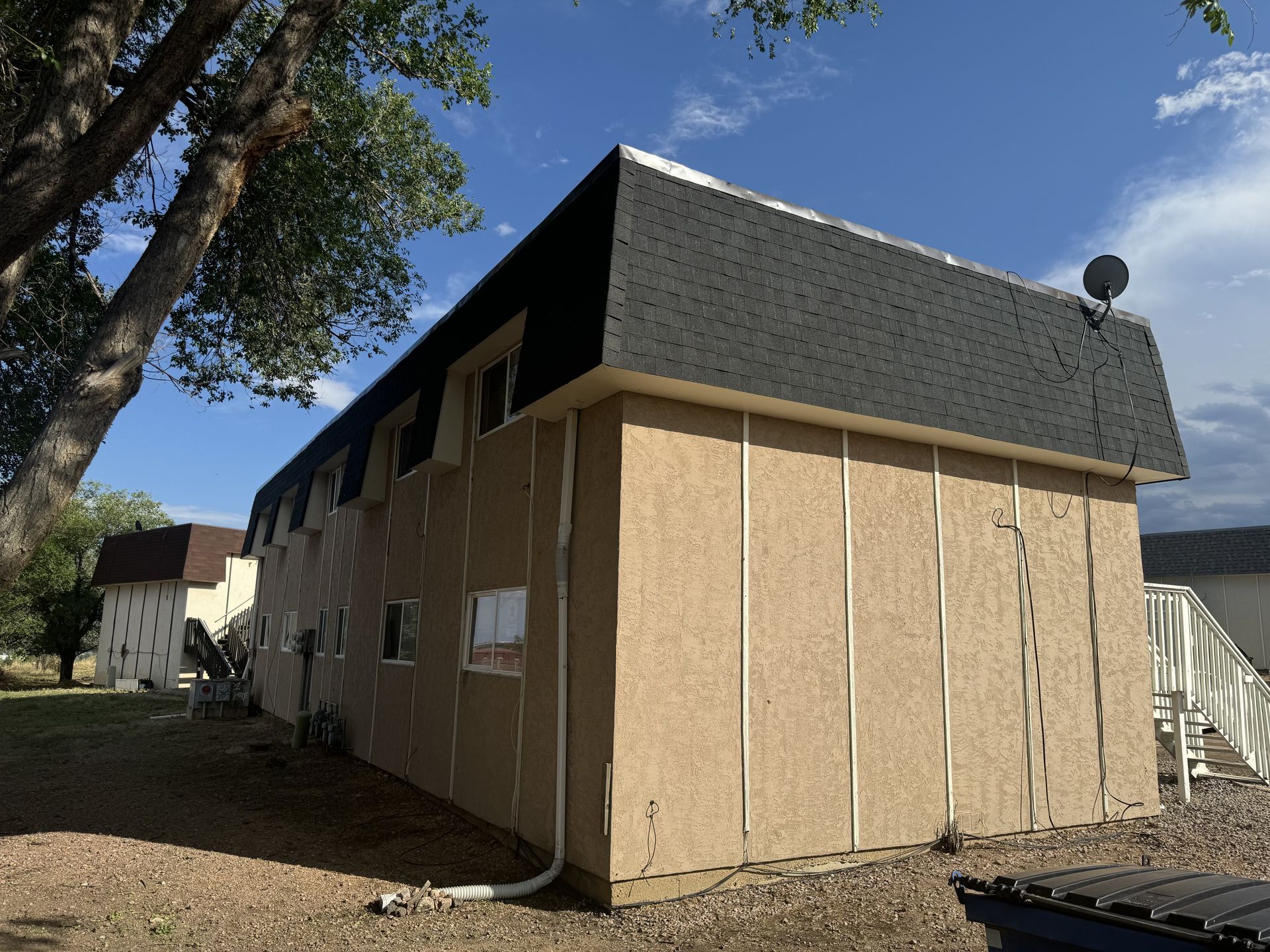 A building with a satellite dish on top of it