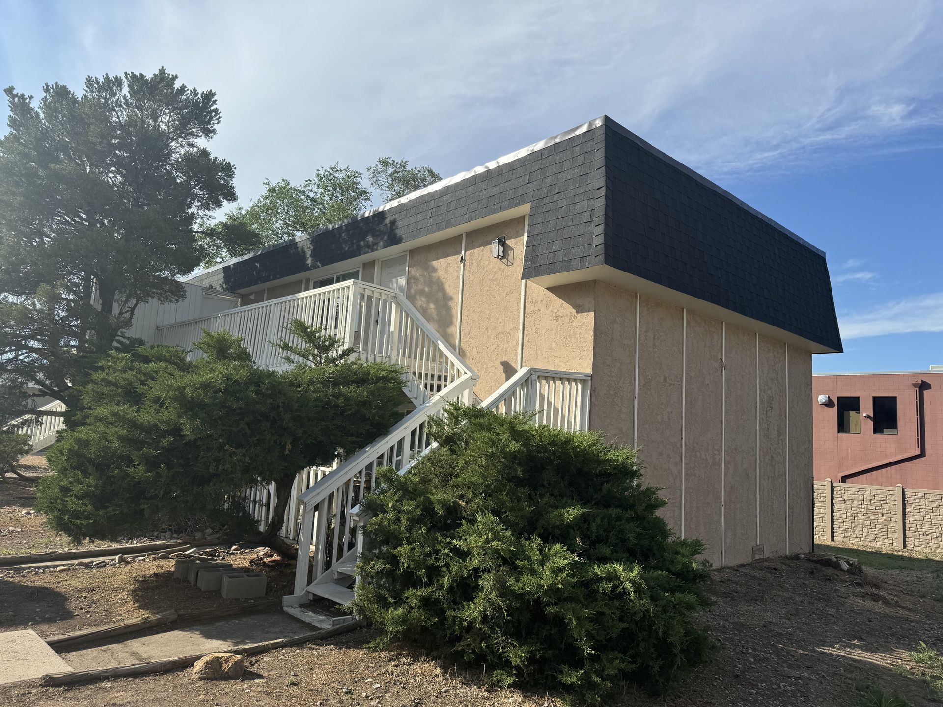 A house with stairs leading up to the second floor