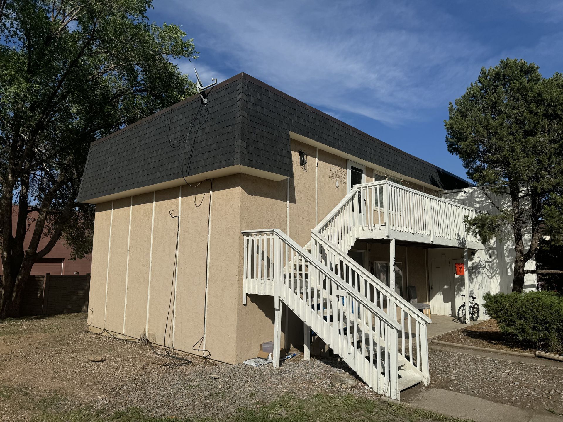 A house with stairs leading up to the second floor