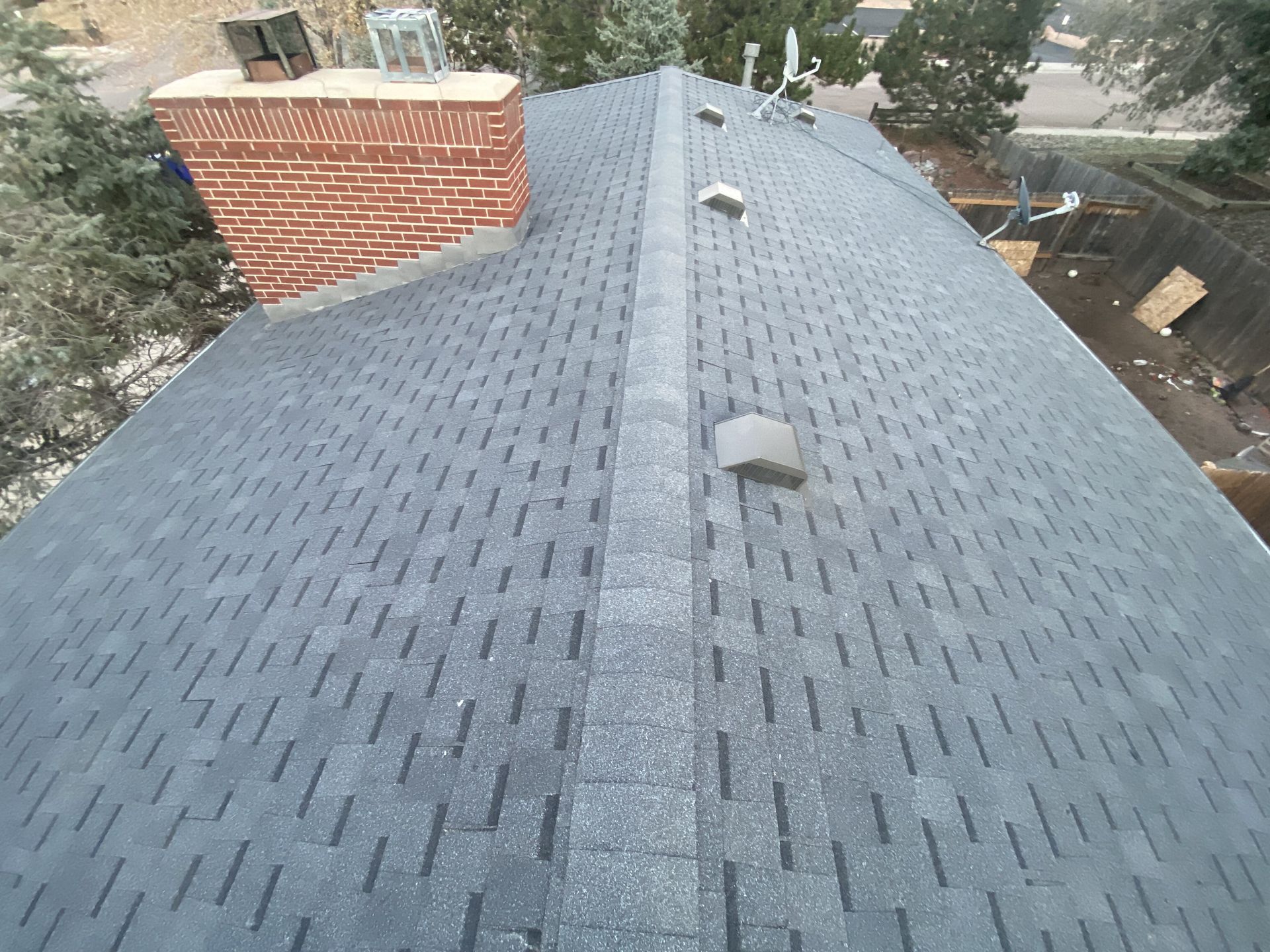 A roof with a chimney on top of it