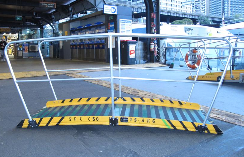 A yellow and green gangway with the letters lfc on it