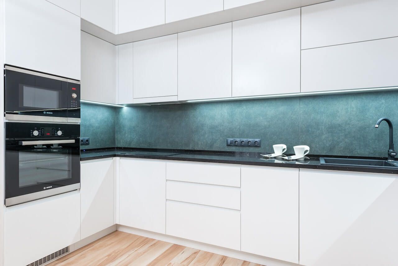 Blue green minimalist kitchen backsplashes can tie together a modern kitchen design