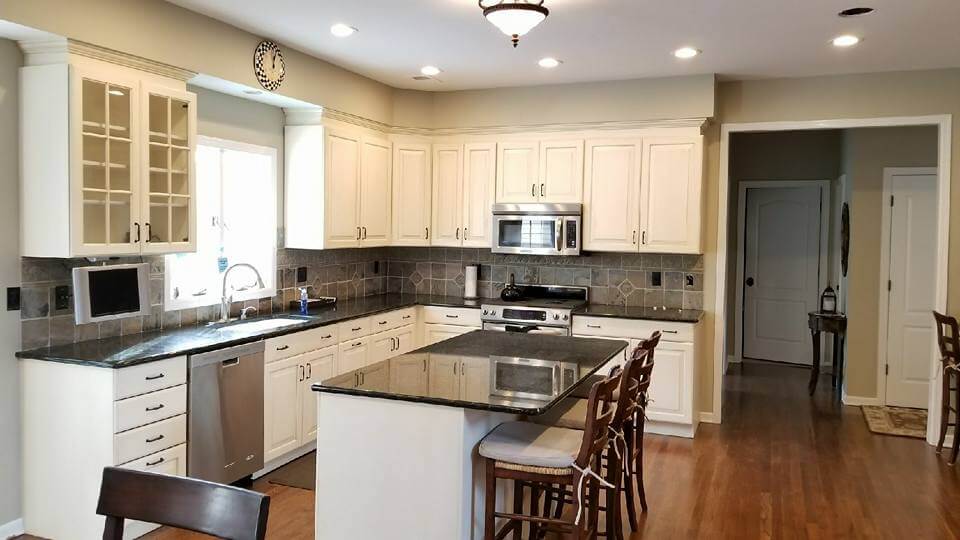 A Monmouth County NJ kitchen with off-white cabinets refinished by Oceanside Painting & Refinishing