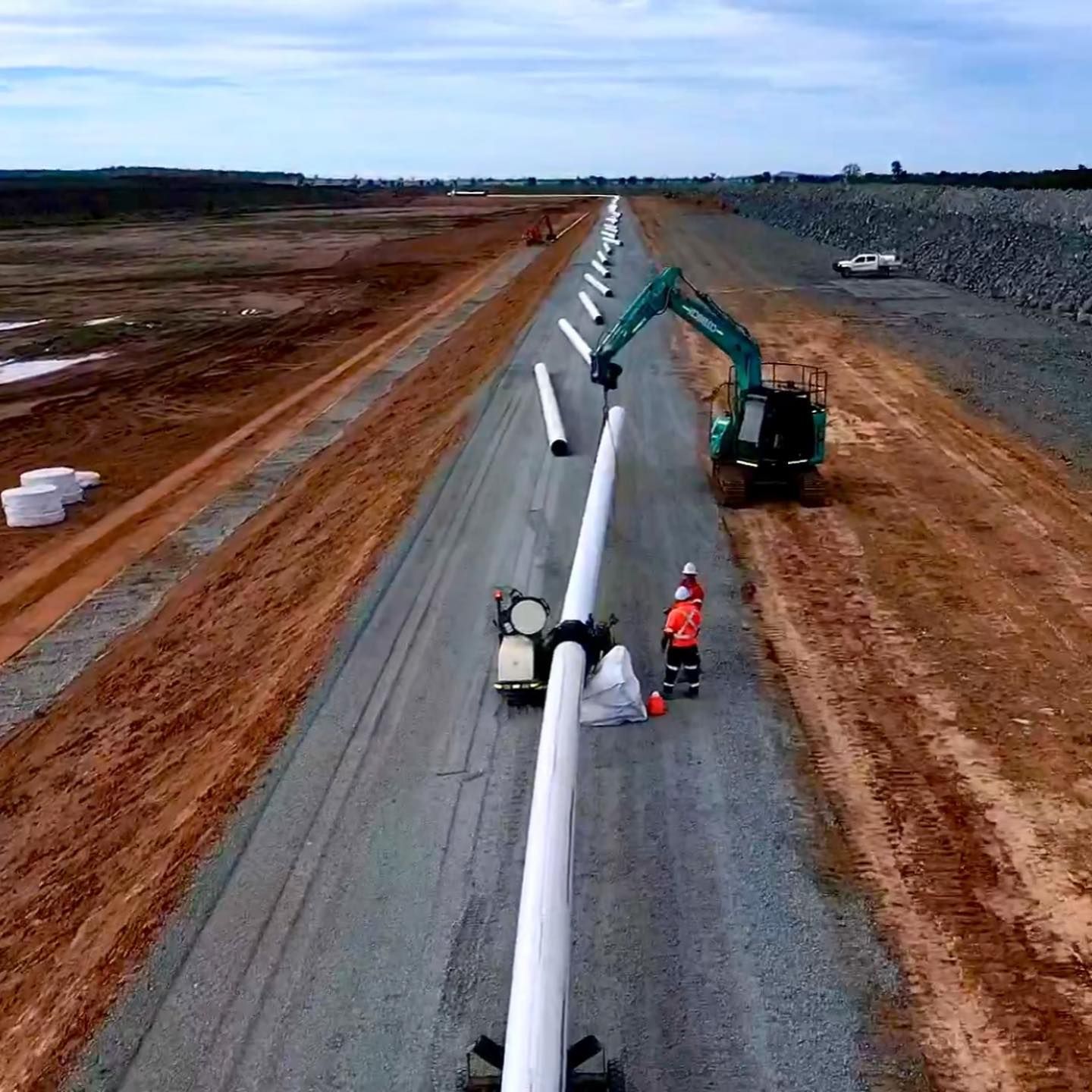 A Large Pipe Is Being Installed On The Side Of A Road — Blackpoly Pipelines in Mudgee, NSW