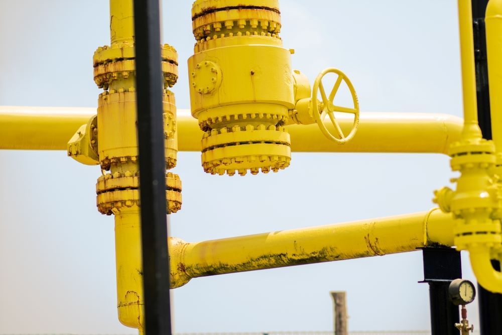 A Close-up View Of A Yellow Pipe Featuring A Valve — Blackpoly Pipelines in Cowra, NSW