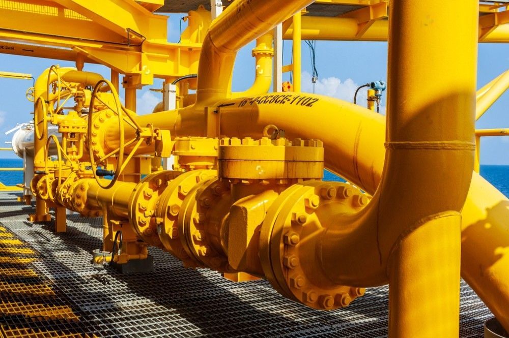 A Bunch Of Yellow Pipes Are Sitting On Top Of A Metal Platform — Blackpoly Pipelines in West Wyalong, NSW