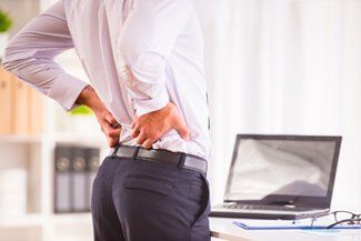 A Man Having a Back Pain — Solon, OH — Core Elite Wellness Fit Cryo LLC