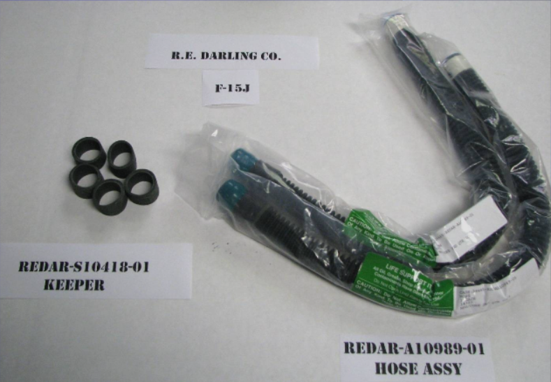 Parts for repair, labeled: hose assembly, keeper, and company name.