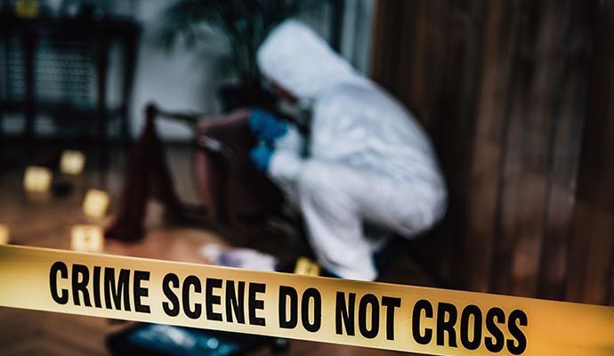 Crime scene with yellow tape reading