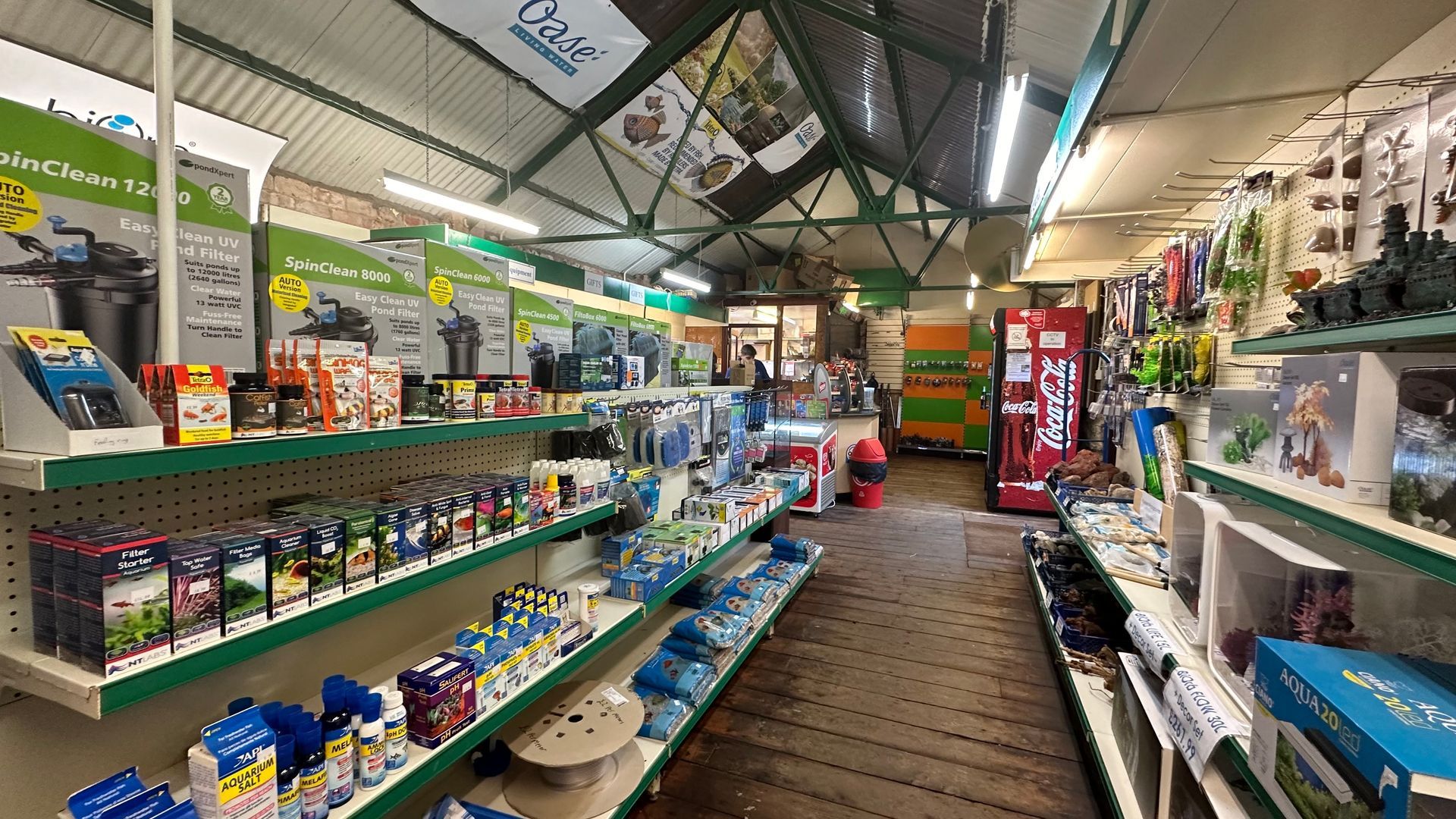 A store filled with lots of shelves filled with lots of products.