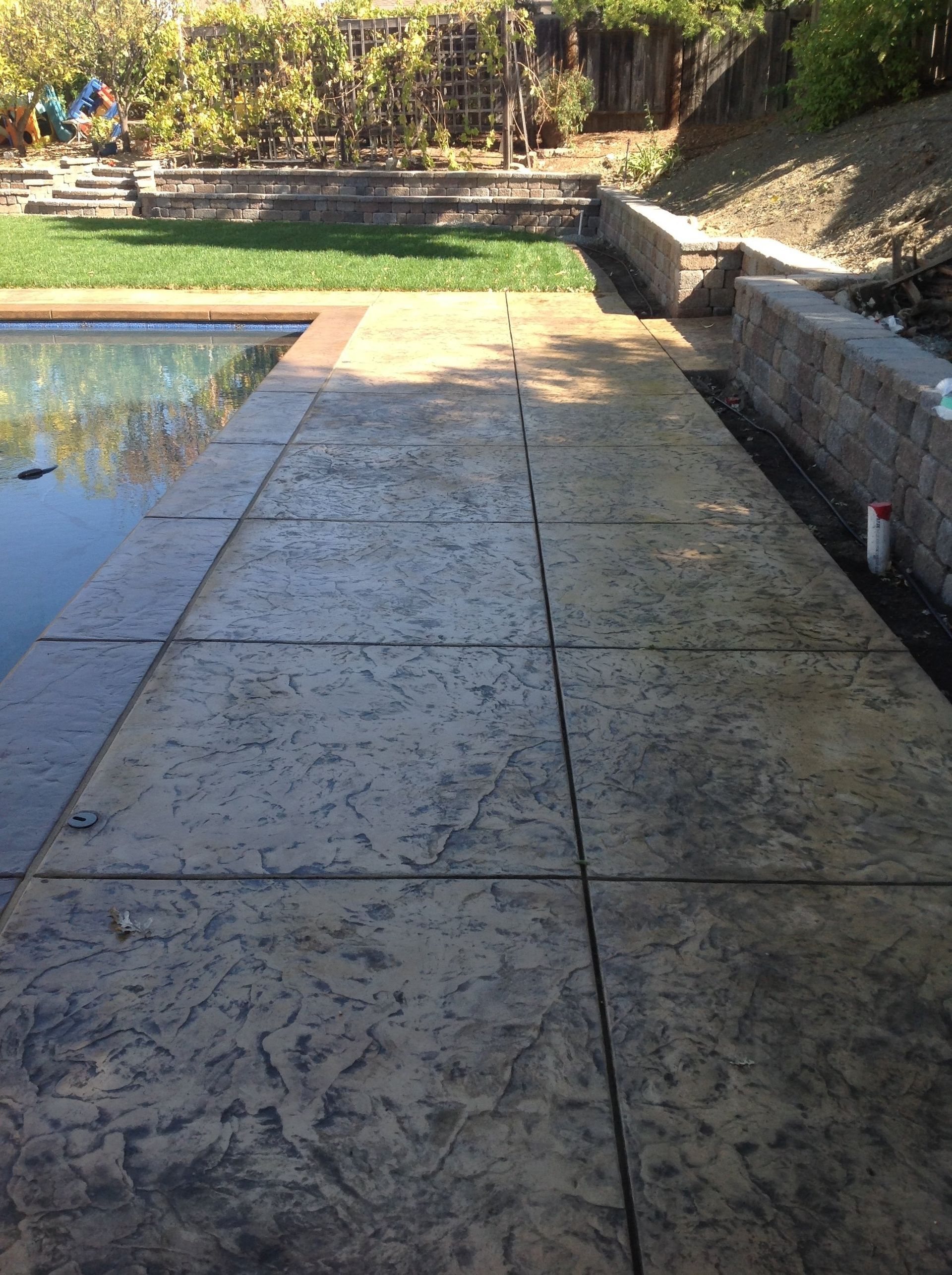 Modern Poolside Pavers by Turfworks Inc., expert Paver Contractors in Vacaville, CA.