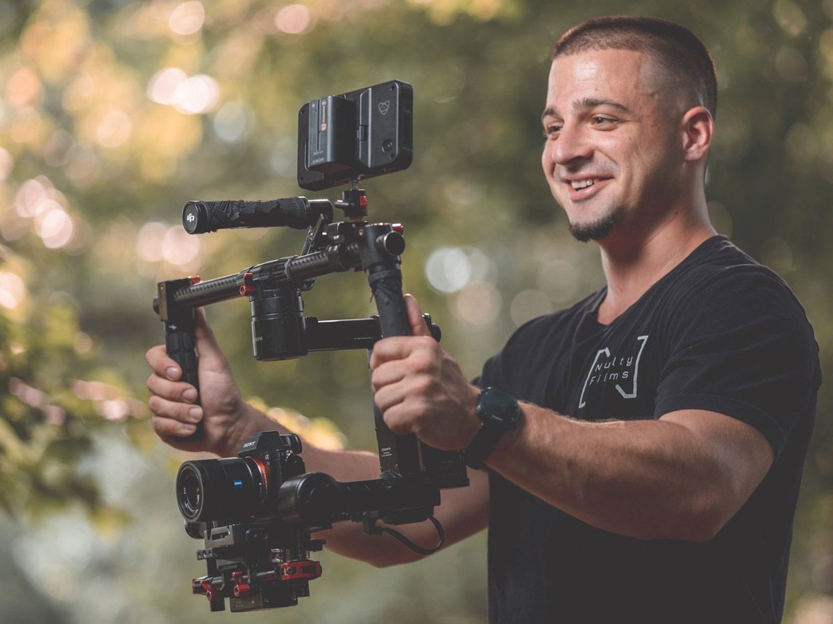 A person holding filming equipment — Brick, NJ — NJ Filmmaker