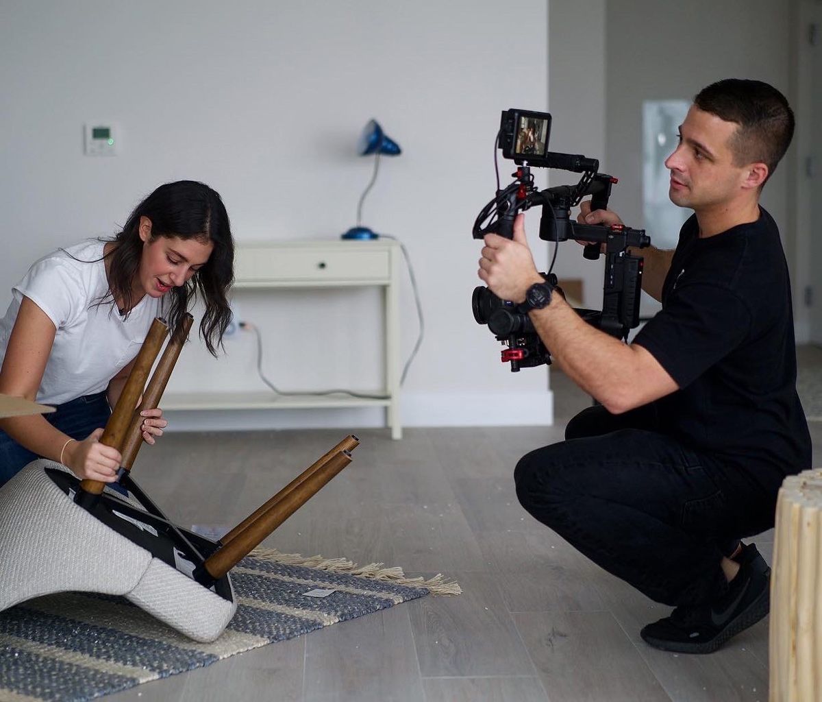 A man filming a woman fixing a chair — Brick, NJ — NJ Filmmaker