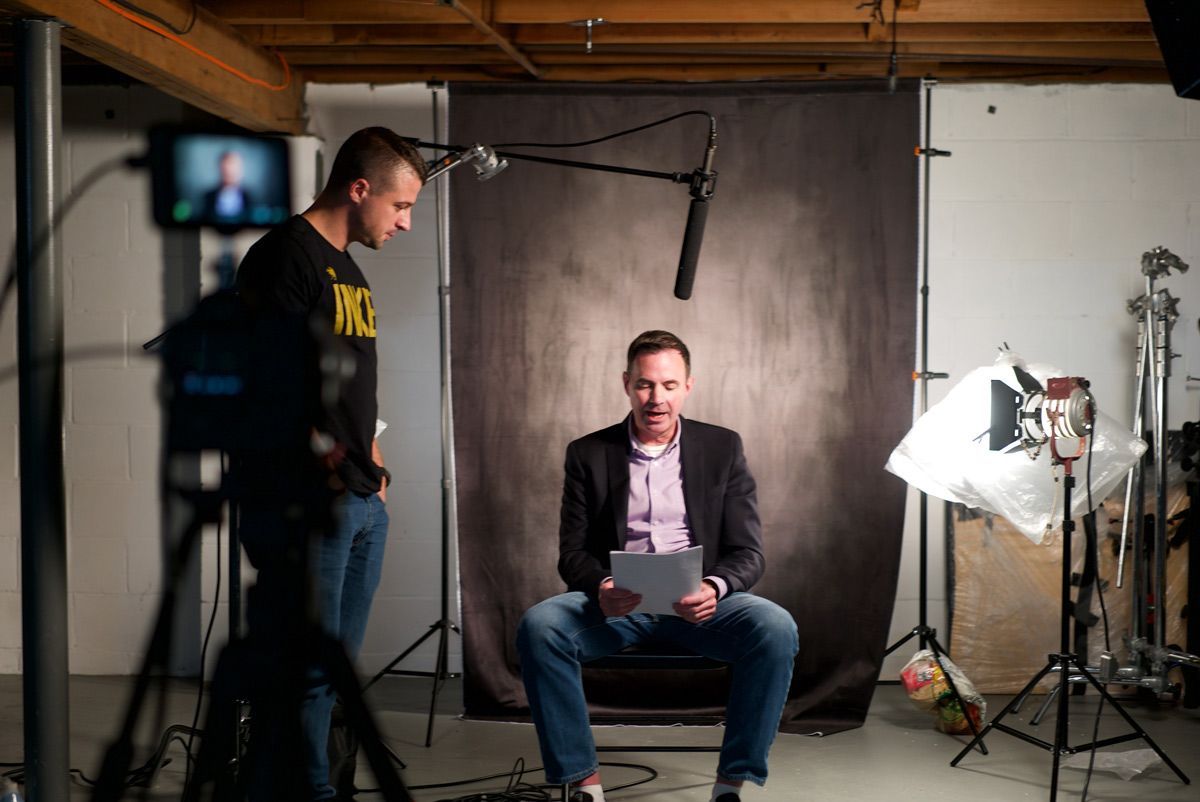 A person sitting on a chair reading a script — Brick, NJ — NJ Filmmaker