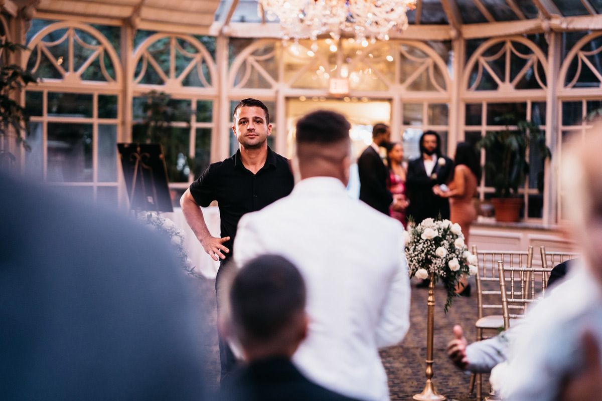 A man standing in the middle of a wedding reception — Brick, NJ — NJ Filmmaker