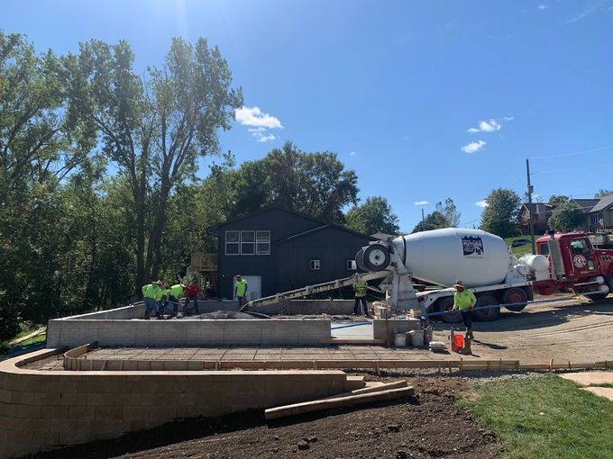 Concrete being poured for a foundation.