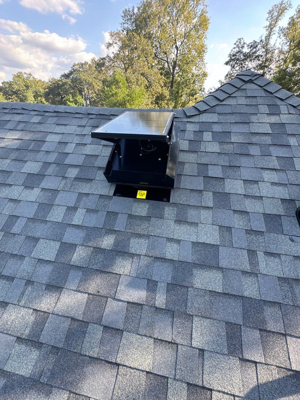 roof replacement - with a solar attic fan to keep the attic cool and the roof safe